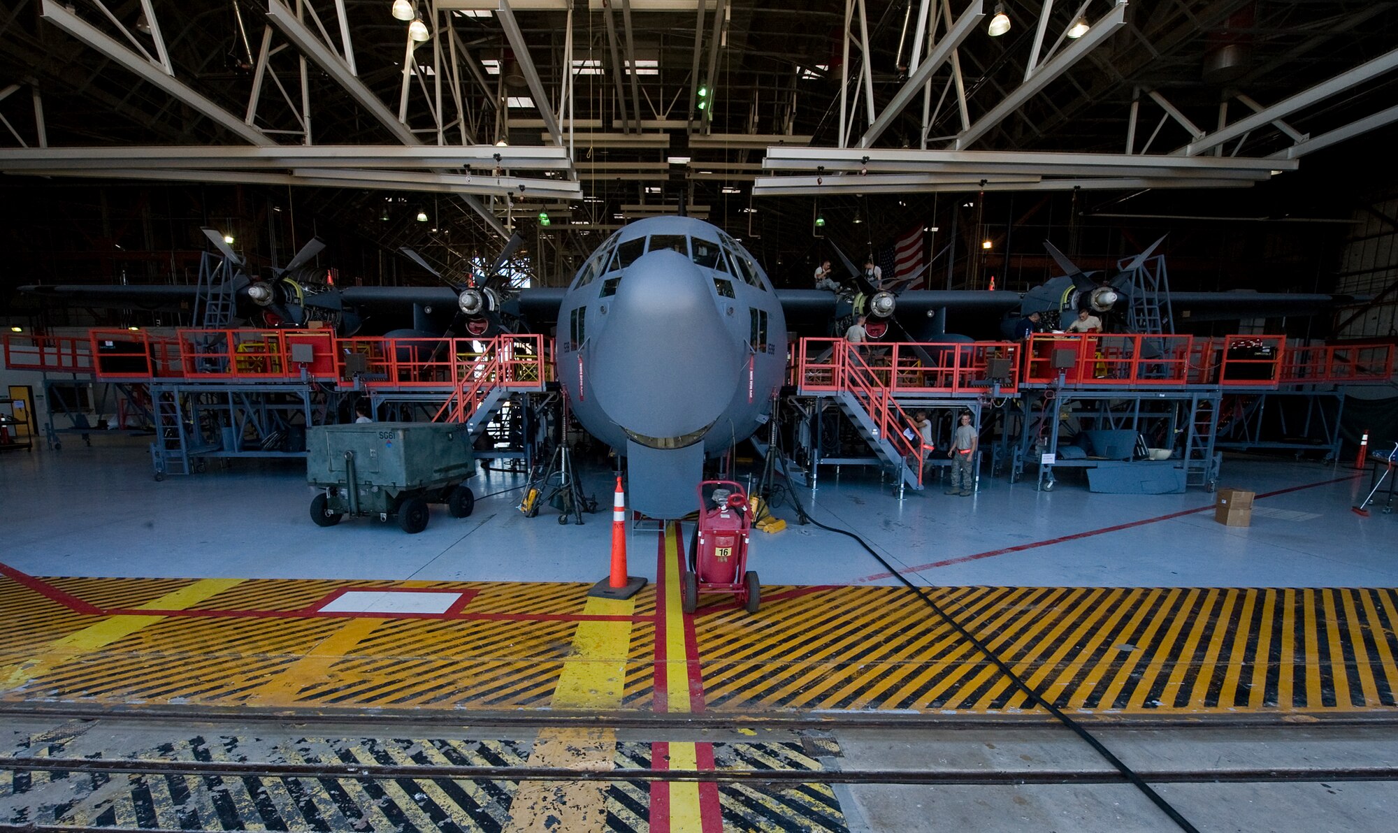 Airmen from the 317th Maintenance Squadron perform an isochronal inspection on a C-130H July 20, 2012, at Dyess Air Force Base, Texas. During the inspection, Airmen took the aircraft apart to check for cracks, damages and worn parts. Once the aircraft is repaired, servicemembers put it back together and ensure everything works properly. The ISO inspection on aircraft 73-1598 marks the last time a C-130H will be inspected at Dyess.  The H-model era will come to an end later this year when the last C-130H will be withdrawn from service at Dyess. The fleet of 33 H-models will be replaced with 28 new C-130Js, making the 317th Airlift Group the largest J-model unit in the world. (U.S. Air Force photo by Airman 1st Class Damon Kasberg/Released)