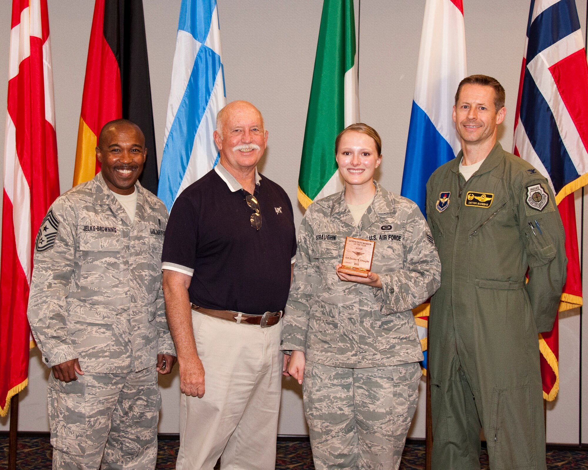 Mr. Mike Winslow an Air Force Association chapter representative, presented the 2012 Texas Air Force Association Outstanding Airman of the Year award to Senior Airman Desiree Straughn, at a luncheon at the Sheppard Club July 25.