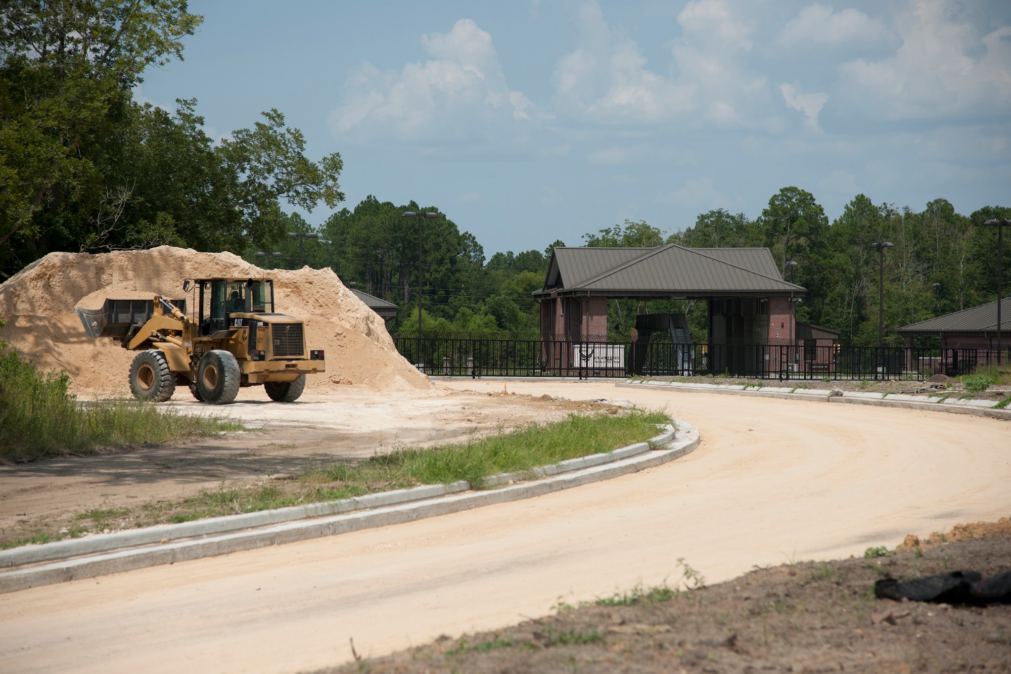 Road construction takes place outside the new Moody Air Force Base, Ga., gate July 25, 2012. The new gate will give the base an additional entrance and will feature a search station for delivery trucks. (U.S. Air Force photo by Airman 1st Class Paul Francis/Released)
