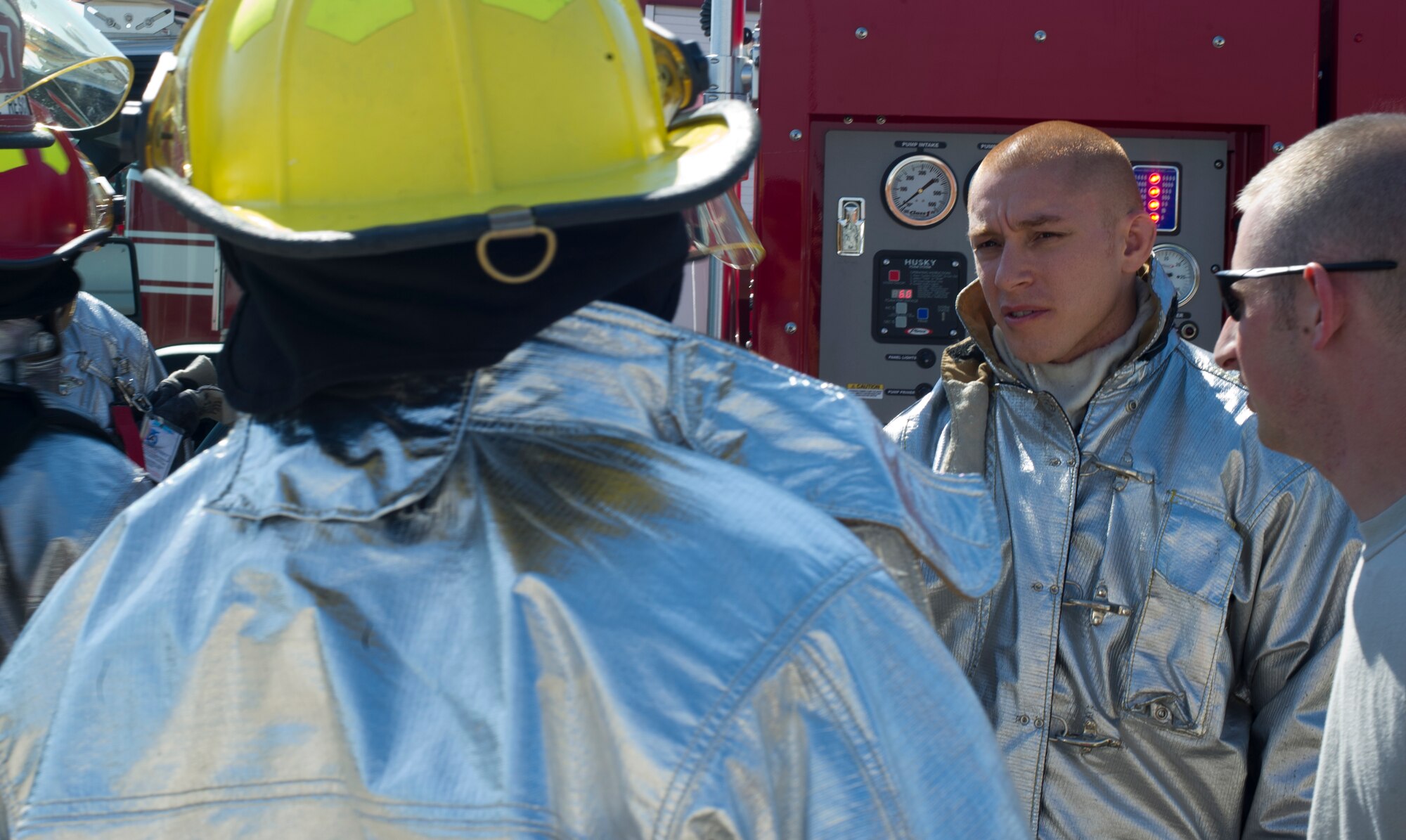 McConnell firefighters and Tech. Sgt. StephenPina, 22nd Civil Engineer Squadron firefighter, prepare for a training exercise June 8, 2012, McConnell Air Force Base, Kan. Along with his duties as a firefighter. Pina has developed a love and respect for mixed martial arts and competes in tournaments. Recently, Pina competed in an all branches tournament taking second place for his weight class. (U.S. Air Force photo/ Airman 1st Class Armando A. Schwier-Morales) 