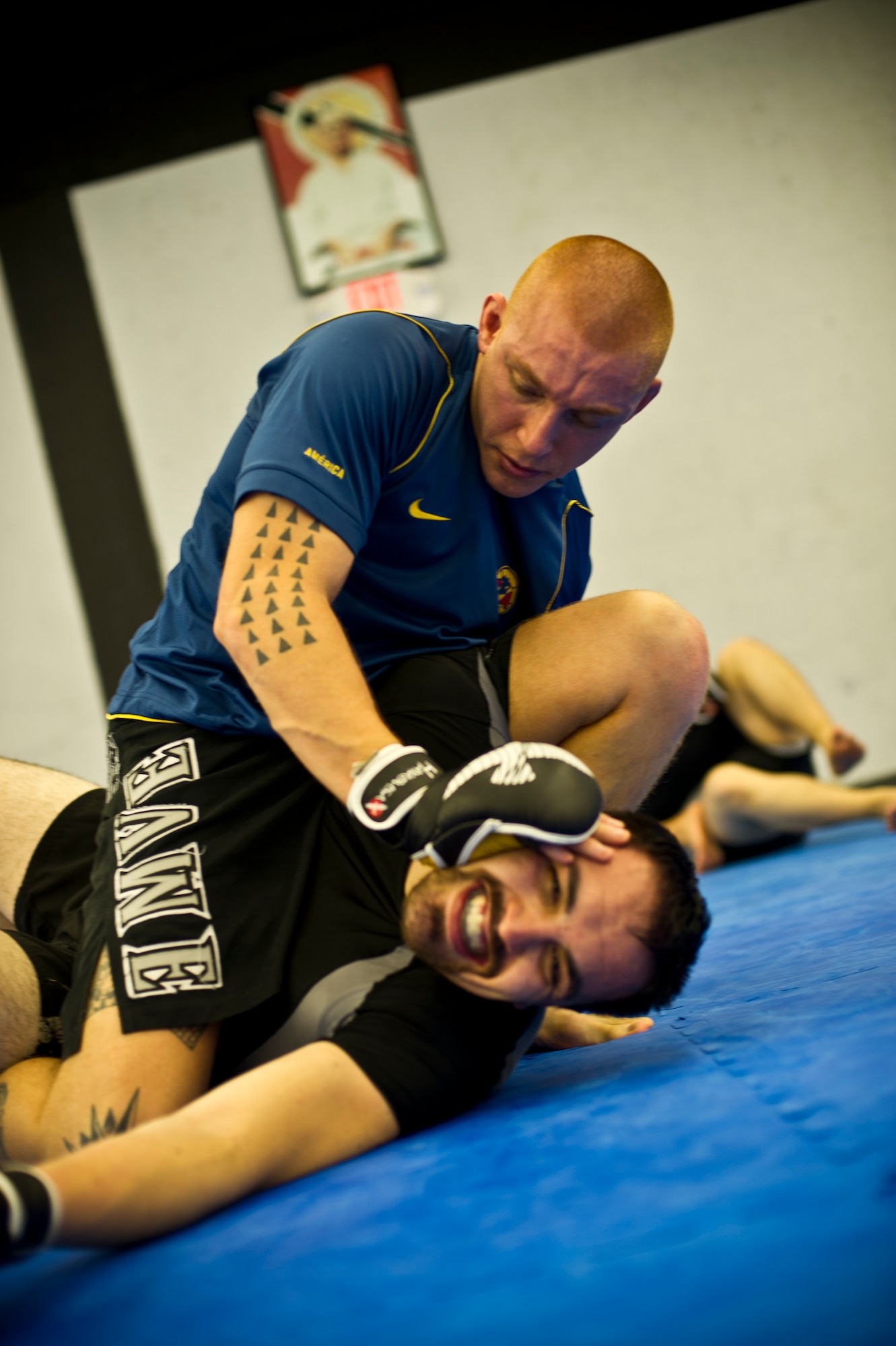 Tech. Sgt. Stephen Pina, 22nd Civil Engineer Squadron firefighter, attempts to gain the advantage on his sparring partner during a practice fight June 7, 2012, Wichita, Kan. Pina was the only Airman to place in the top three in the 2012 U.S. Armed Services Pankration Championship at Camp Horno, Calif. (U.S. Air Force photo/ Airman 1st Class Armando A. Schwier-Morales) 