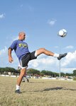 Joint Base San Antonio-Lackland Warhawks midfielder Britton Seprish, 66th Training Squadron, warms up before tryouts July 12 at the Defense Language Institute English Language Center soccer field. (U.S. Air Force photo/Alan Boedeker)
