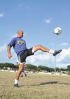 Joint Base San Antonio-Lackland Warhawks midfielder Britton Seprish, 66th Training Squadron, warms up before tryouts July 12 at the Defense Language Institute English Language Center soccer field. (U.S. Air Force photo/Alan Boedeker)