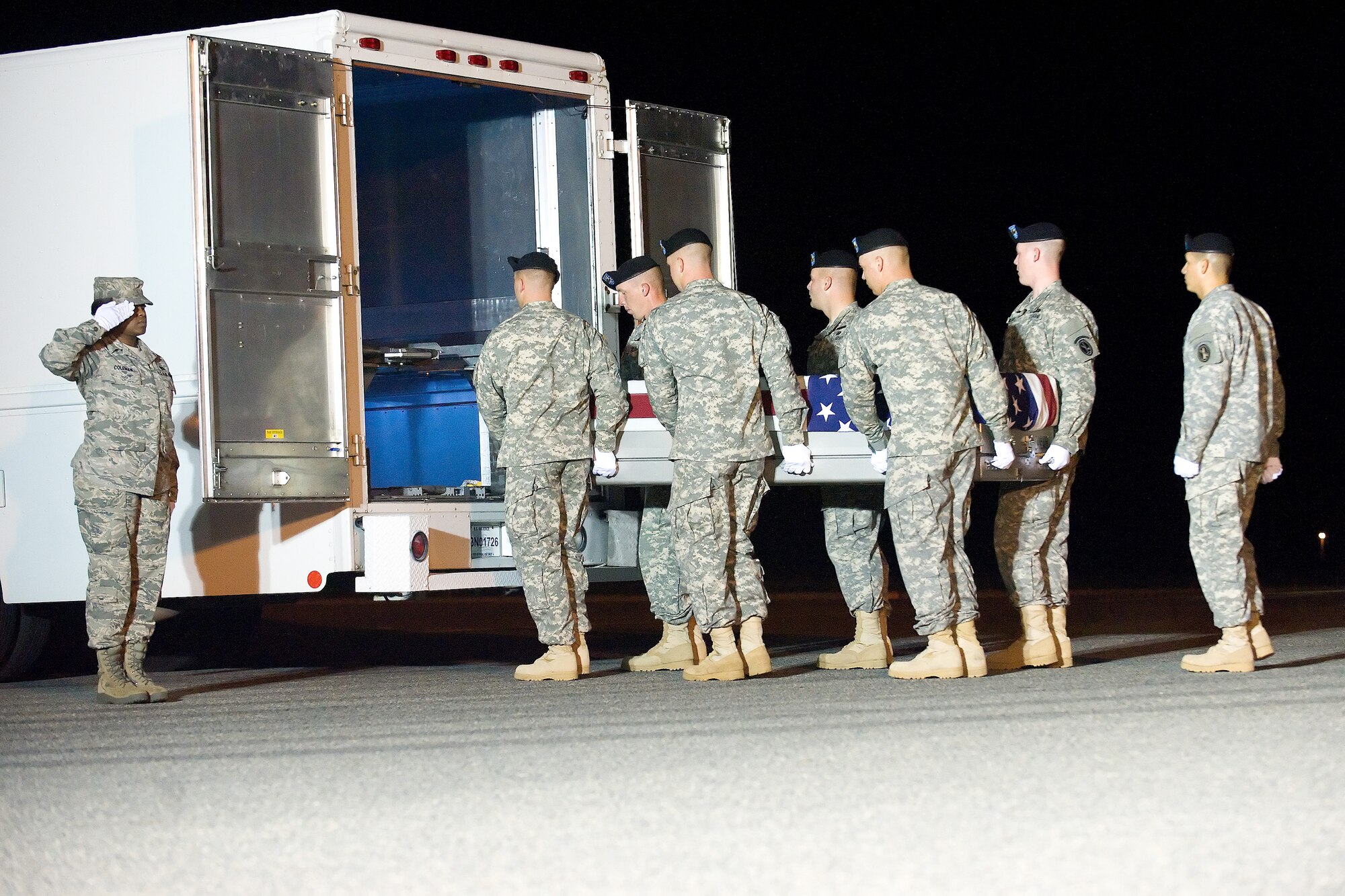 A U.S. Army carry team transfers the remains of Army Pfc. Adam C. Ross of Lyman, S.C., at Dover Air Force Base, Del., July 26, 2012. Ross was assigned to the 2nd Battalion, 503rd Infantry Regiment, 173rd Airborne Brigade Combat Team, Vicenza, Italy. (U.S. Air Force photo/Adrian R. Rowan)