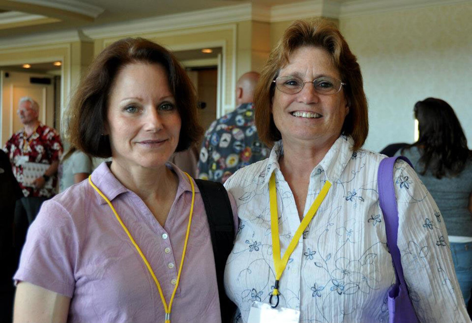 TRAVIS AIR FORCE BASE, Calif. -- Col. Nancy Mikulin, Commander, 349th Aeromedical Evacuation Squadron, pictured here alongside Charlene White, Travis Key Spouse Representative, attend the Yellow Ribbon event in San Diego during the weekend of July 20, 2012. Colonel Mikulin is attending the Yellow Ribbon event to gain valuable insight to the services available to her squadron deployers, and be able to give that insight to her Airmen through her Commanders Calls, she said.(U.S. AIR FORCE PHOTO/ Senior Airman Amelia Leonard)