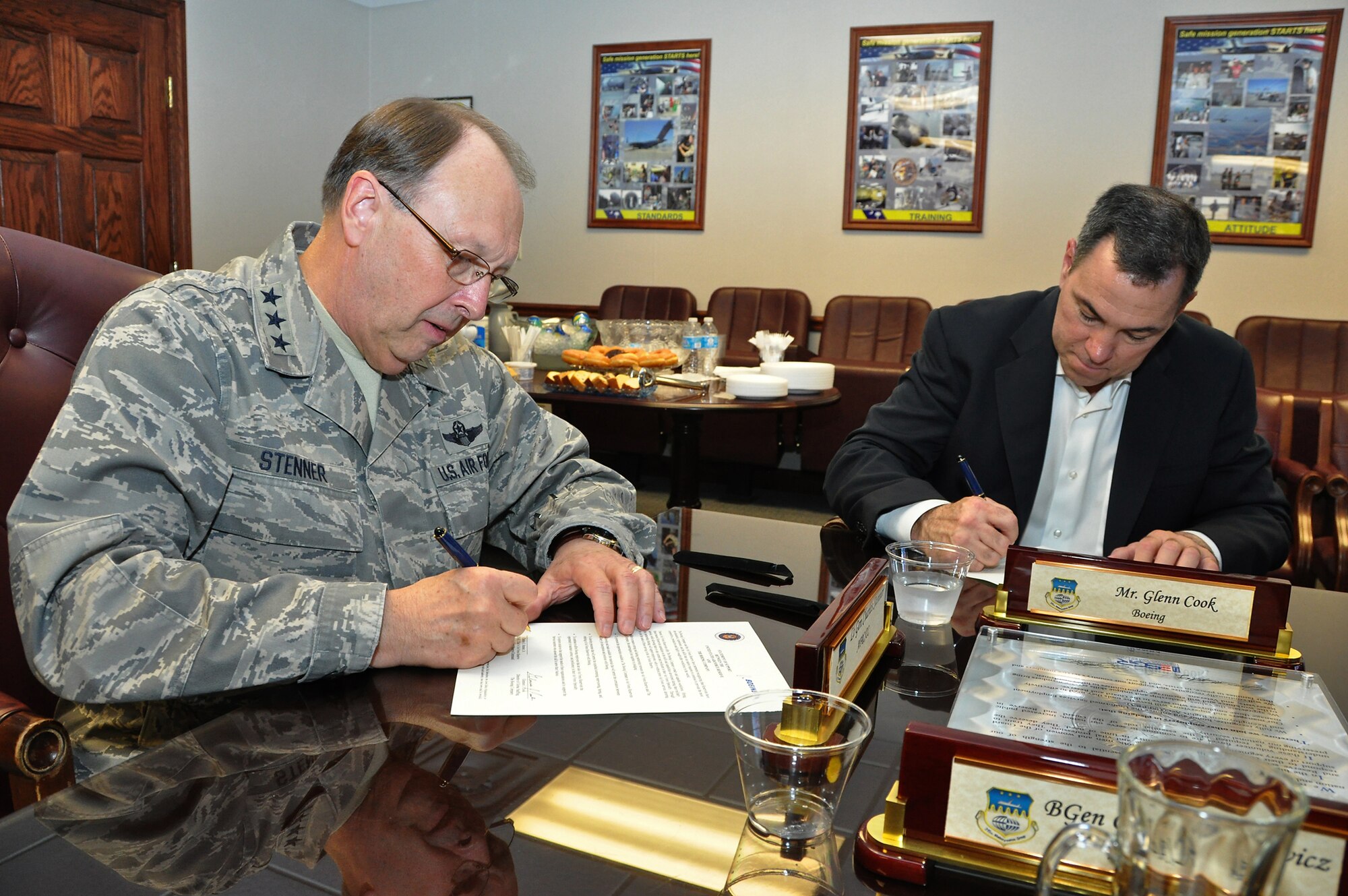 Lt. Gen. Charles Stenner, Air Force Reserve Chief visited Joint Base Charleston July 25 to sign an Employer Support of Guard and Reserve statement of support with Boeing. While at the base the general toured the Field Training Detachment. There, reservists and active duty airmen demonstrated various C-17 mockup training equipment, which includes a fully operational cockpit that allows trainer to introduce faults into the system for maintenance workers to troubleshoot.  FTD also has complete engine assemblies, operational landing gear systems, tail structures and more.
ESGR is a Department of Defense Agency that seeks to promote a culture which all American employers will value the support the military service of their employees and in this case, future employees. (U.S. Air Force photo / Michael Dukes)
