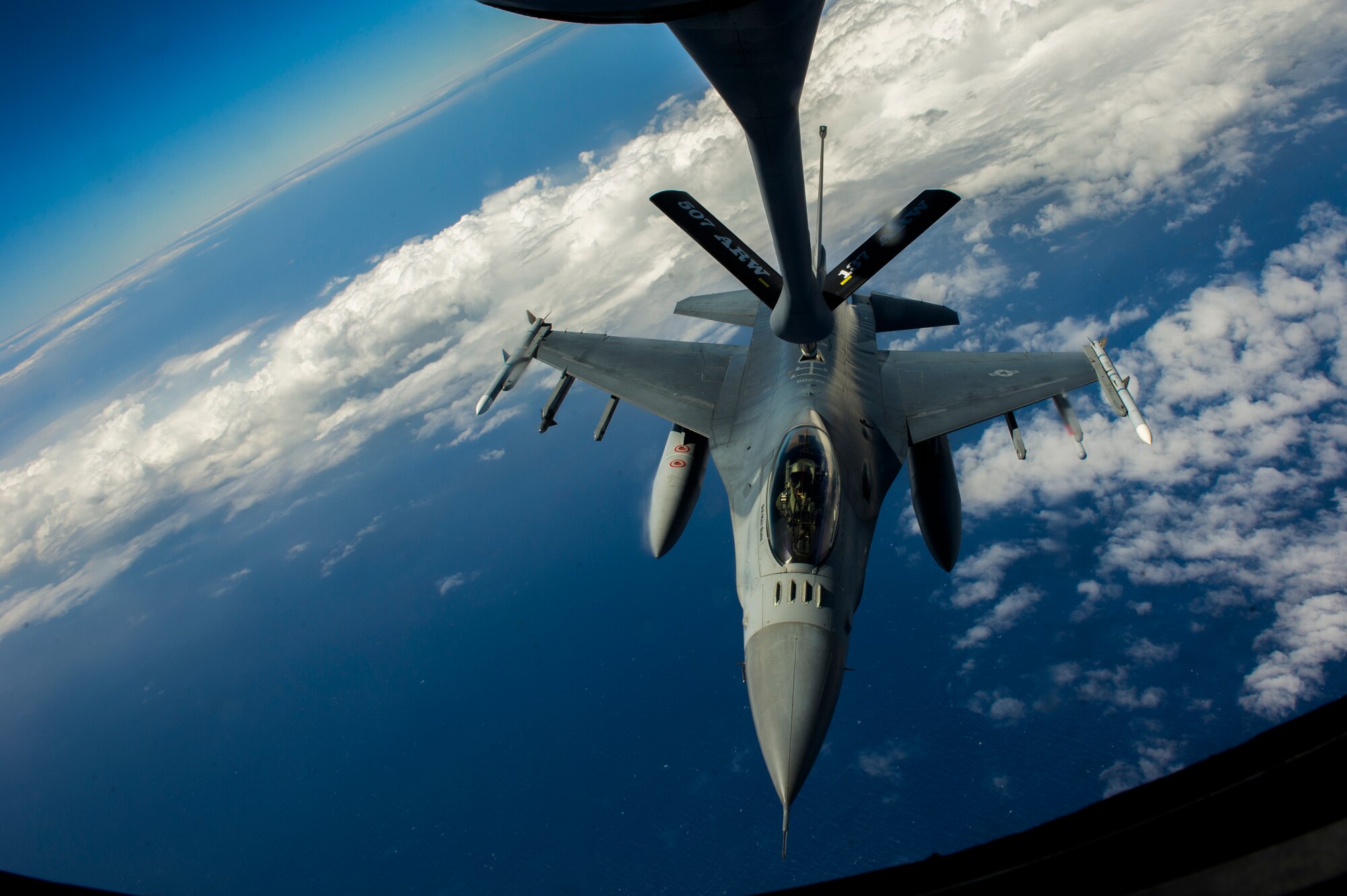 U.S. Air Force F-16C Fighting Falcon refuels east of Hawaii by a KC-135R Stratotanker with the 465th Air Refueling Squadron July 24, 2012. Twenty-two nations, more than 40 ships and submarines, more than 200 aircraft and 25,000 personnel are participating in RIMPAC exercise from June 29 to Aug. 3, in and around the Hawaiian islands. The world's largest international maritime exercise, RIMPAC provides a unique training opportunity that helps participants foster and sustain the cooperative relationships that are critical to ensuring the safety of sea lanes and security on the world's oceans. RIMPAC 2012 is the 23rd exercise in the series that began in 1971.
