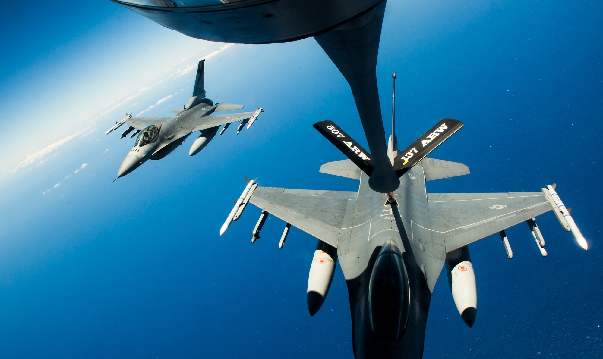 U.S. Air Force F-16C Fighting Falcon refuels east of Hawaii by a KC-135R Stratotanker with the 465th Air Refueling Squadron July 24, 2012. Twenty-two nations, more than 40 ships and submarines, more than 200 aircraft and 25,000 personnel are participating in RIMPAC exercise from June 29 to Aug. 3, in and around the Hawaiian Islands. The world's largest international maritime exercise, RIMPAC provides a unique training opportunity that helps participants foster and sustain the cooperative relationships that are critical to ensuring the safety of sea lanes and security on the world's oceans. RIMPAC 2012 is the 23rd exercise in the series that began in 1971.
