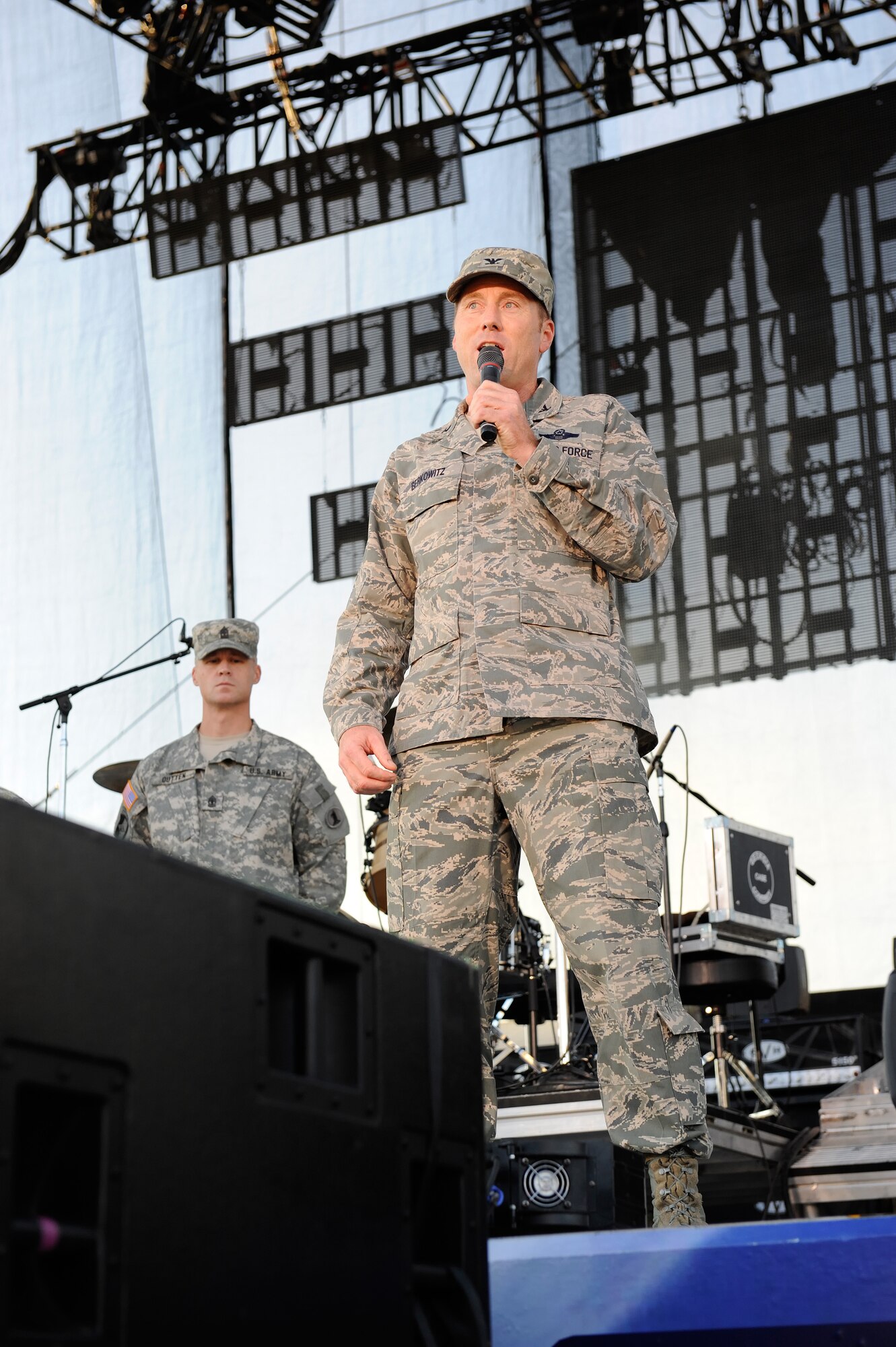 Col. David K. Berkowitz, vice commander of the 512th Airlift Wing, Dover Air Force Base, Del., talks about the service of Air Force Reserve members July 25, 2012, during Military Appreciation Day at the 93rd Annual Delaware State Fair in Harrington, Del. Berkowitz, an American Airlines pilot as a civilian, spoke prior to a concert by Jason Aldean and Rachel Farley. (Jason Minto Photography)