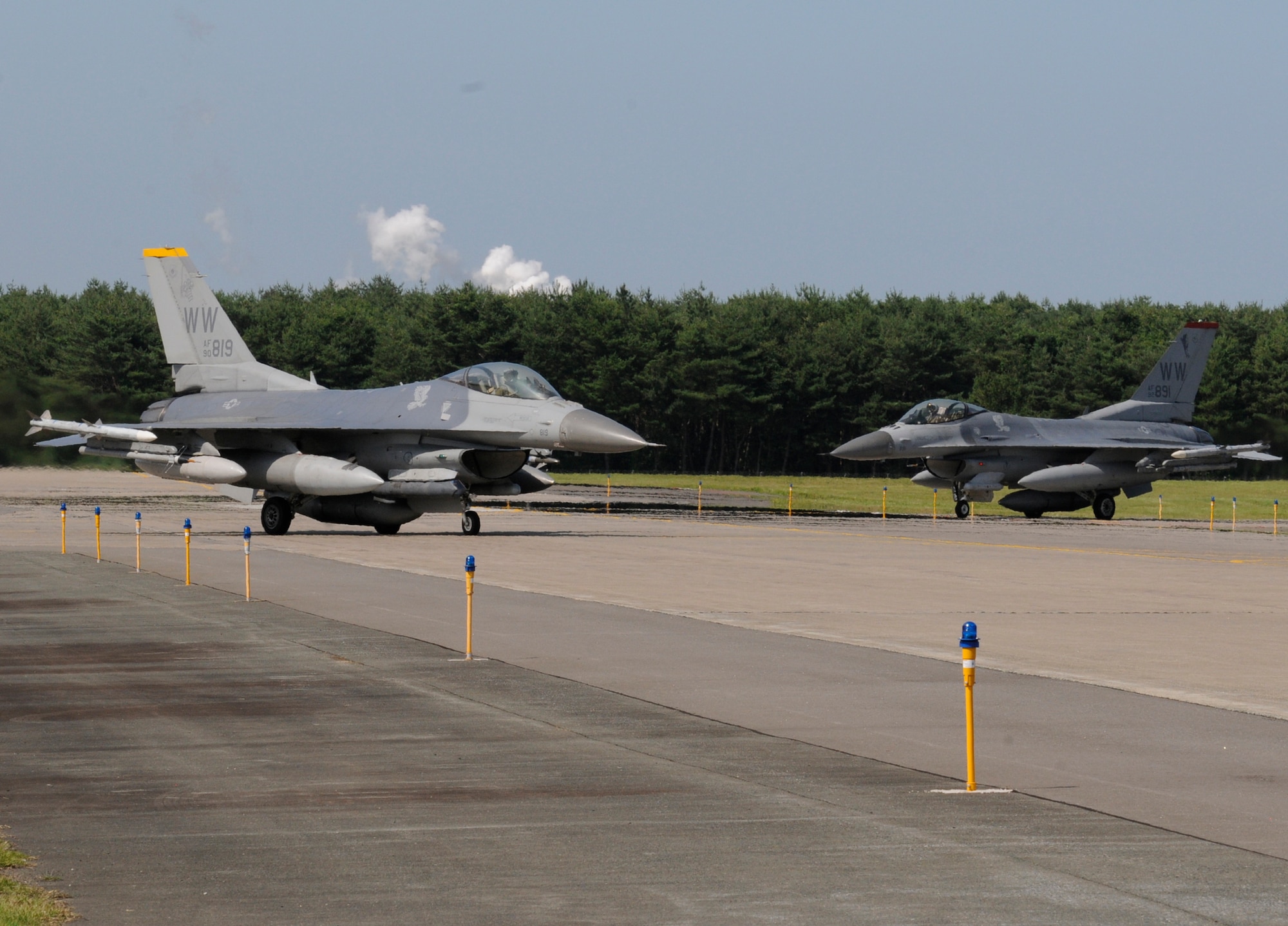 Misawa’s F-16 Fighting Falcons line up to launch after a temporary suspension was lifted at Misawa Air Base, Japan, July 26, 2012. The revalidation and certification of all aircraft was done by the 35th Fighter Wing following the loss of an aircraft July 22, 2012. (U.S. Air Force photo by Airman 1st Class Zachary Kee/Released)