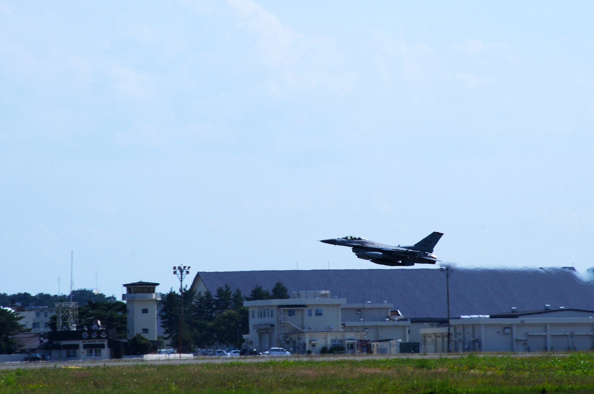 An F-16 Fighting Falcon launches to complete its mission after a temporary suspension was lifted at Misawa Air Base, Japan, July 26, 2012. The 35th Fighter Wing has been heavily engaged in revalidating and certifying the safety of its aircraft following the loss of an aircraft July 22, 2012. (U.S. Air Force photo by Staff Sgt. April Quintanilla/Released)