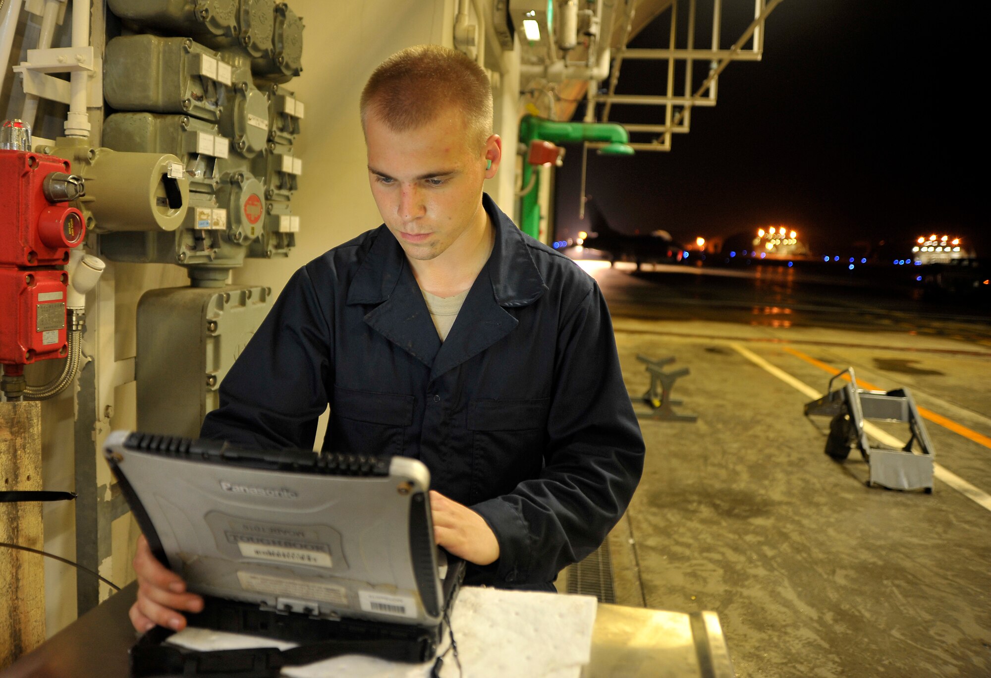 U.S. Air Force Airman 1st Class Mark Ward, 14th Fighter Squadron crew chief, uses technical orders as he inspects an F-16 Fighting Falcon at Misawa Air Base, Japan, July 25, 2012. Technical orders contain the methods and procedures for U.S. Air Force equipment modifications and inspections. The 35th Fighter Wing has resumed its flying mission after grounding aircrafts for additional inspections coupled with stringent routine checks when a pilot ejected from his F-16 in the Pacific Ocean on July 22. (U.S. Air Force photo by Staff Sgt. Nathan Lipscomb/Released)