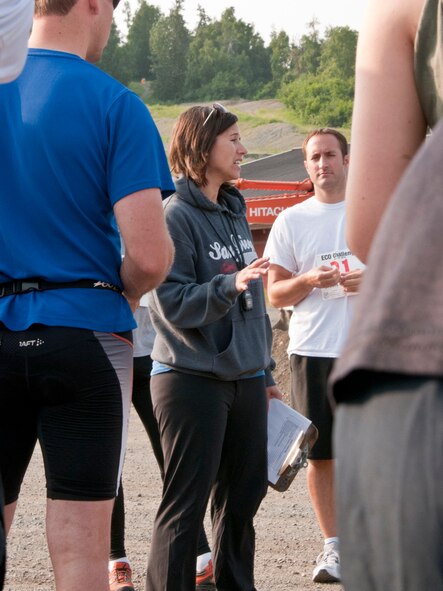 JOINT BASE ELMENDORF-RICHARDSON -- Linda Neely, the aquatics and fitness manager at the Elmendorf Fitness Center, briefs competitors before the Eco Challenge here July 20. Military and community members across the base participated in this annual, multi-sport event hosted by the base fitness centers. National Guard photo by Staff Sgt. N. Alicia Goldberger.