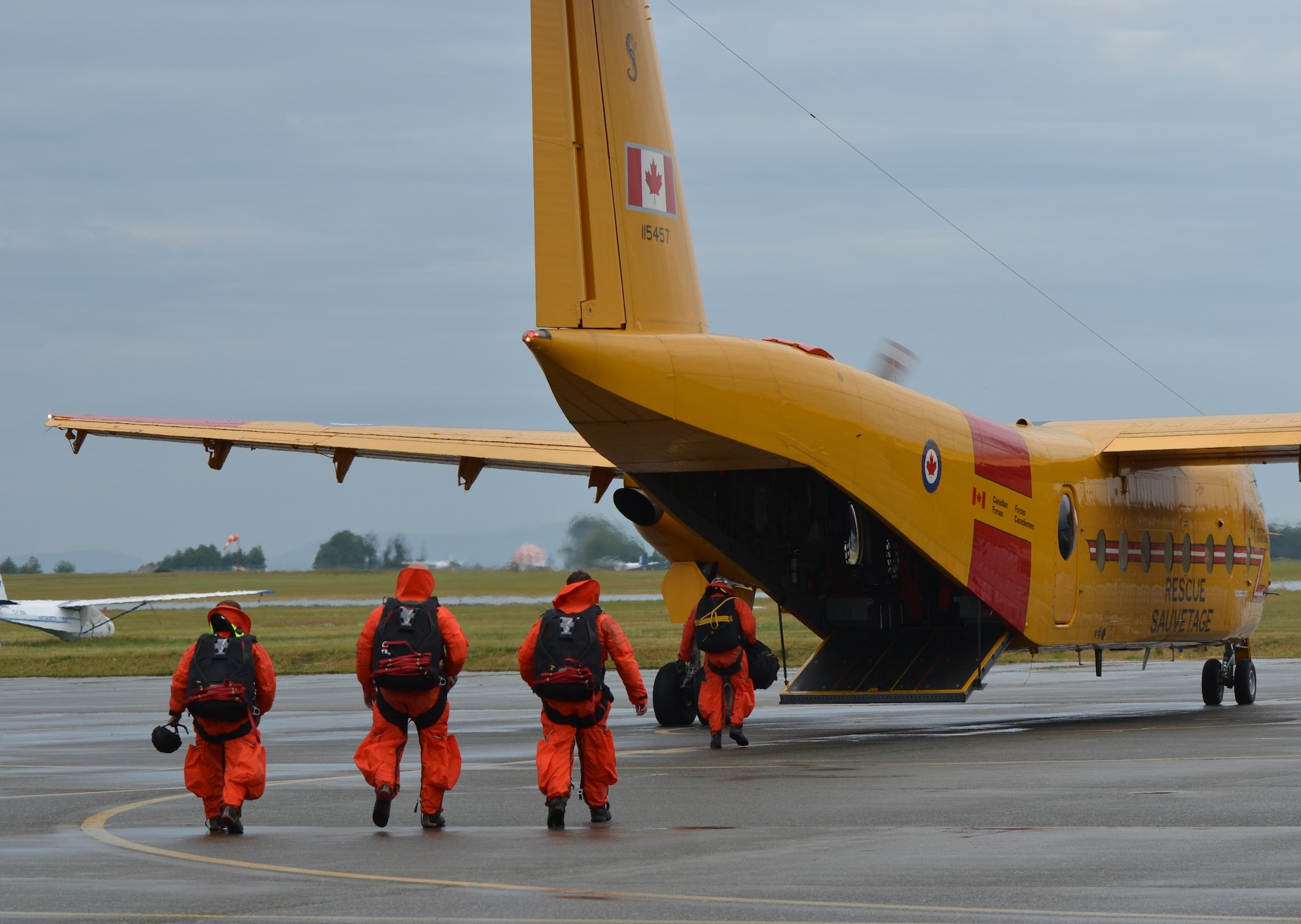 Pararescuemen from the 308th Rescue Squadron, Patrick Air Force Base, Fla., board a Canadian C-115 aircraft in Comox, Canada, to practice a static line jump with Canadian search-and-rescue technicians stationed there. The 308th Rescue Squadron, part of the 920th Rescue Wing, participates in three exercises with Canadian search-and-rescue personnel annually. (U.S. Air Force photo/Staff Sgt. Anna-Marie Wyant)