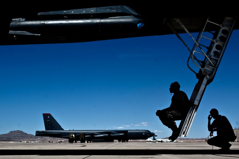 U.S. Air Force Airmen from the 28th Aircraft Maintenance Squadron, Ellsworth Air Force Base, S.D., wait for a B-1B Lancer to launch during the Red Flag 12-4 exercise July 25, 2012, at Nellis Air Force Base, Nev. The B-1B Lancer carries the largest payload of both guided and unguided weapons in the U.S. Air Force inventory. (U.S. Air Force photo by Staff Sgt. Christopher Hubenthal)