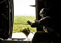 Staff Sgt. Donald McNaron, a loadmaster with the 919th Special Operations Wing, executes an airdrop during an MC-130E Combat Talon I mission from Duke Field, Fla. The 919th are the only wing in the Air Force still flying the Talon I.  Over the next two years, the Talons will be phased out of the 919th as it moves to an Aviation Foreign Internal Defense mission.  (U.S. Air Force photo/Tech. Sgt. Samuel King Jr.)