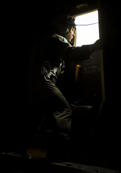 Staff Sgt. Donald McNaron, a loadmaster with the 919th Special Operations Wing, watches the engines begin to start before an MC-130E Combat Talon I mission at Duke Field, Fla. The 919th are the only wing in the Air Force still flying the Talon I.  Over the next two years, the Talons will be phased out of the 919th as it moves to an Aviation Foreign Internal Defense mission.  (U.S. Air Force photo/Tech. Sgt. Samuel King Jr.)