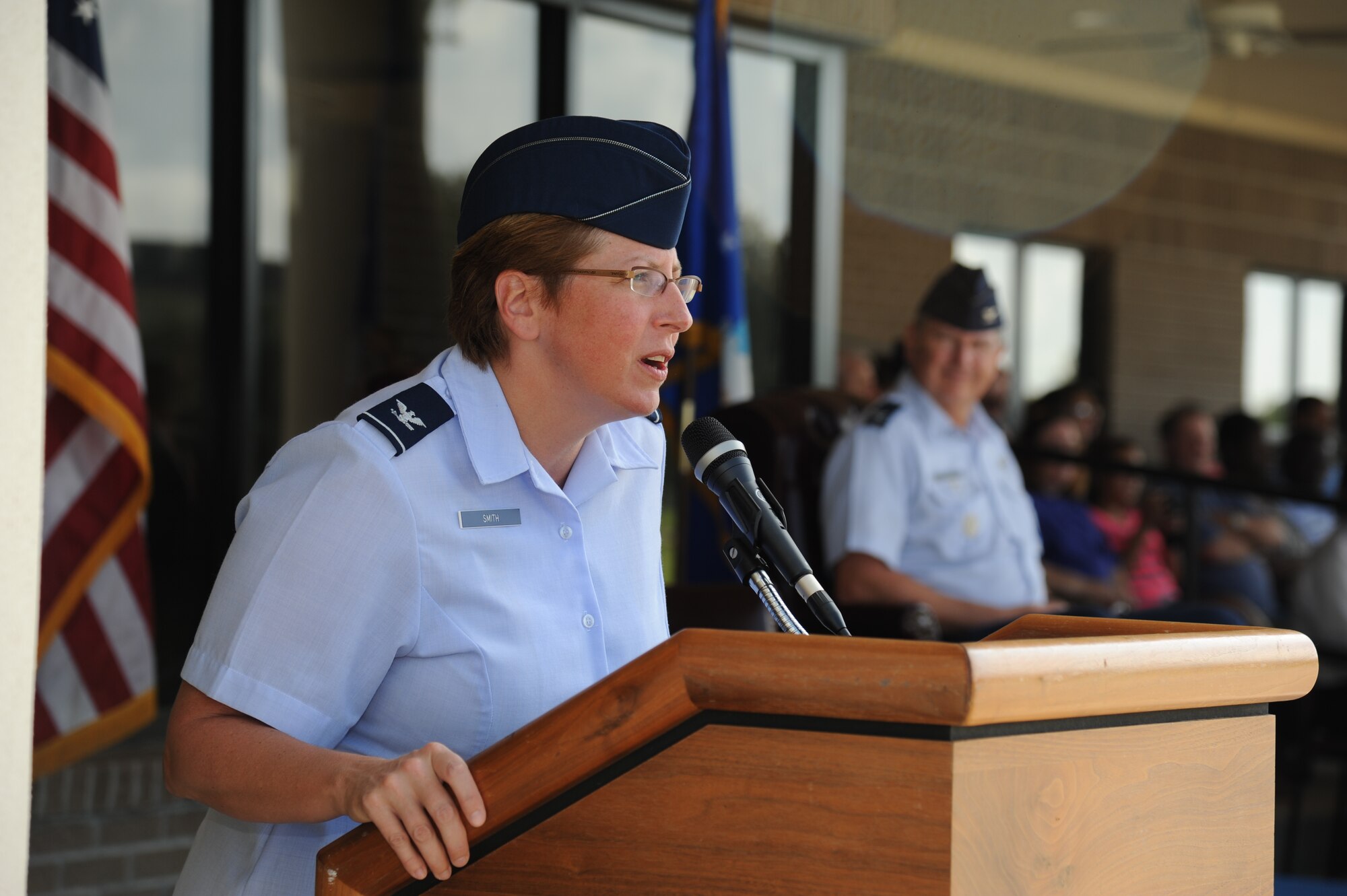 Col. Maureen Smith, 81st Training Group commander, delivers welcoming remarks during a parade at the Levitow Training Support Facility, Keesler Air Force Base, Miss., July 27, 2012.  Approximately 100 JROTC students from seven states attended a week-long JROTC Summer Leadership School at Keesler ending with the parade and a graduation ceremony at the Welch Theater.  (U.S. Air Force photo by Kemberly Groue)