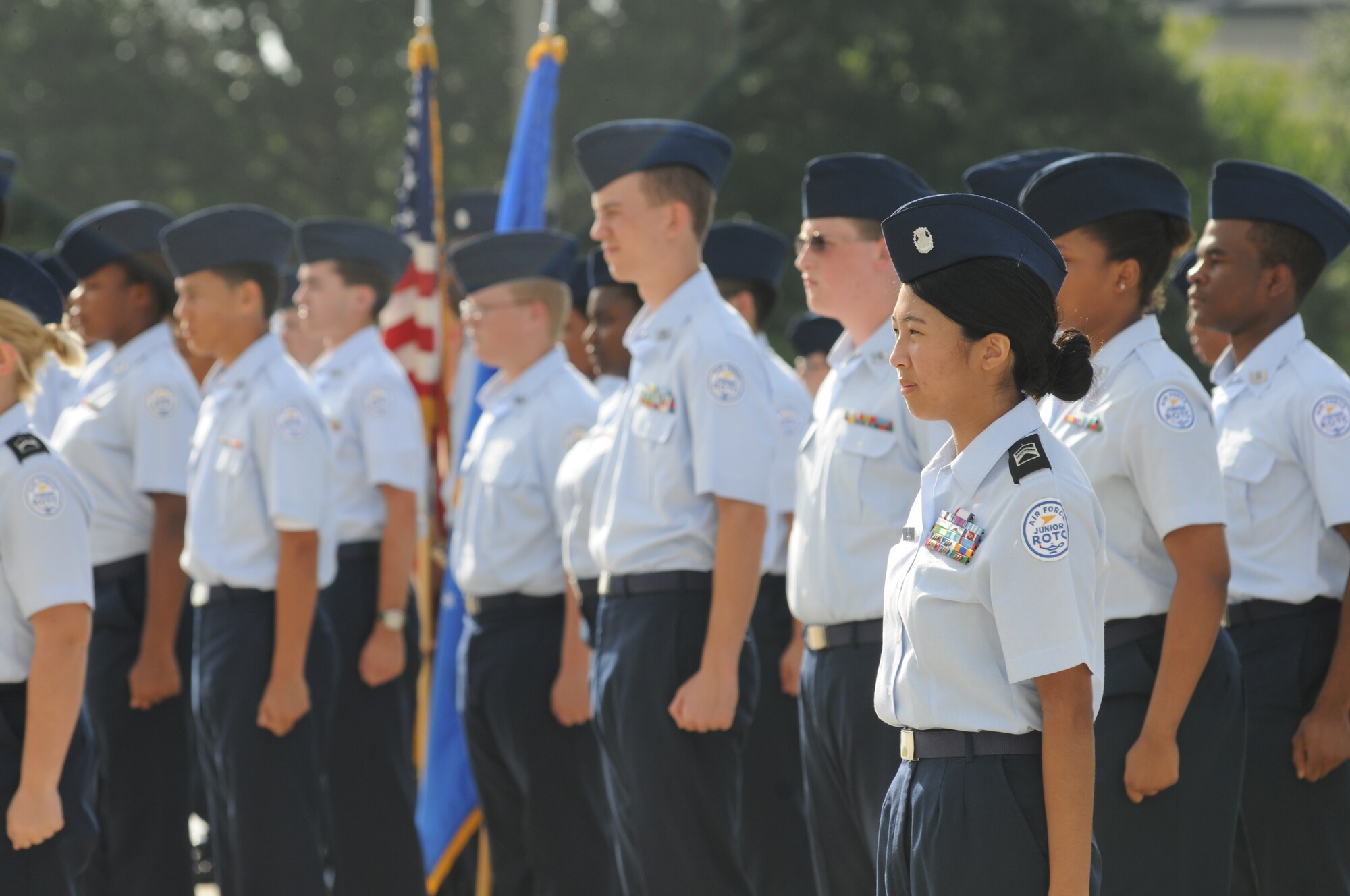 JROTC cadets stand in formation during a parade at the Levitow Training Support Facility, Keesler Air Force Base, Miss., July 27, 2012.  Approximately 100 JROTC students from seven states attended a week-long JROTC Summer Leadership School at Keesler ending with the parade and a graduation ceremony at the Welch Theater.  (U.S. Air Force photo by Kemberly Groue)