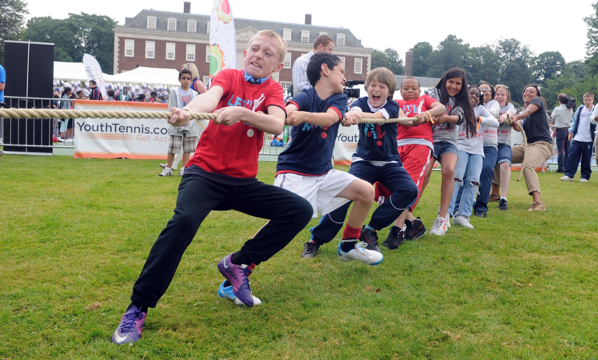 LONDON – Children from the United States and the United Kingdom play tug-of-war at the United States Ambassador to the United Kingdom’s residence during a fitness-themed event July 27, 2012. The festivities, held mere hours before the opening ceremonies of the London 2012 Olympic Games, were part of first lady Michelle Obama’s “Let’s Move!” campaign to combat childhood obesity. The first lady and several Olympic athletes took turns playing games with the kids. (U.S. Air Force photo/Staff Sgt. Austin M. May)