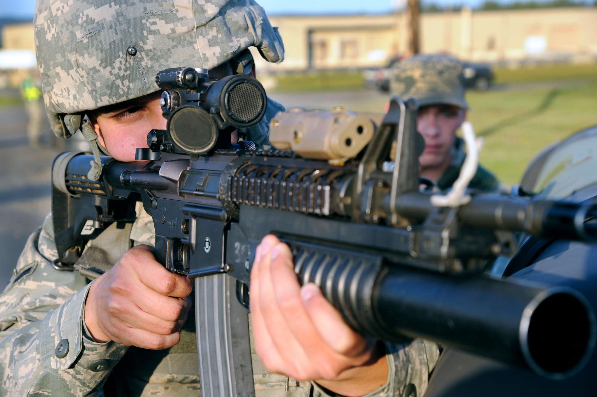 U.S. Air Force Airman 1st Class Patrick Shirley, 354th Security Forces Squadron security forces specialist, takes aim with an M-4 carbine during an operational readiness exercise July 26, 2012, Eielson Air Force Base, Alaska. The exercise tests a wing’s capability to respond to various scenarios. (U.S. Air Force photo/Staff Sgt. Jim Araos)