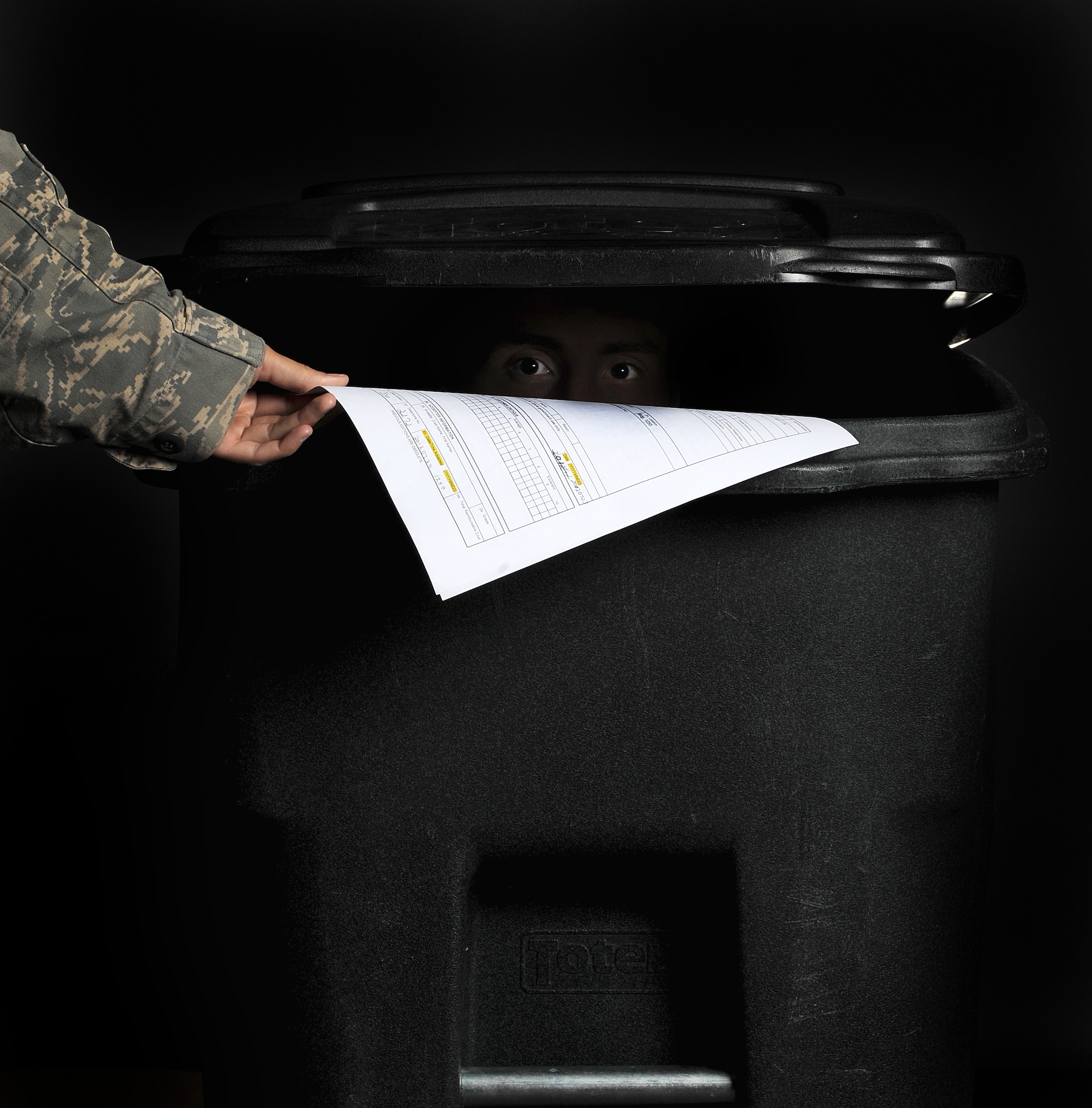 Making sure all important documents containing sensitive ifnormation are shredded or destroyed before they are trashed could be the difference between life and death. In the military, OPSEC is a 24/7 operation. (U.S. Air Force Photo by Staff Sgt. Russ Scalf)