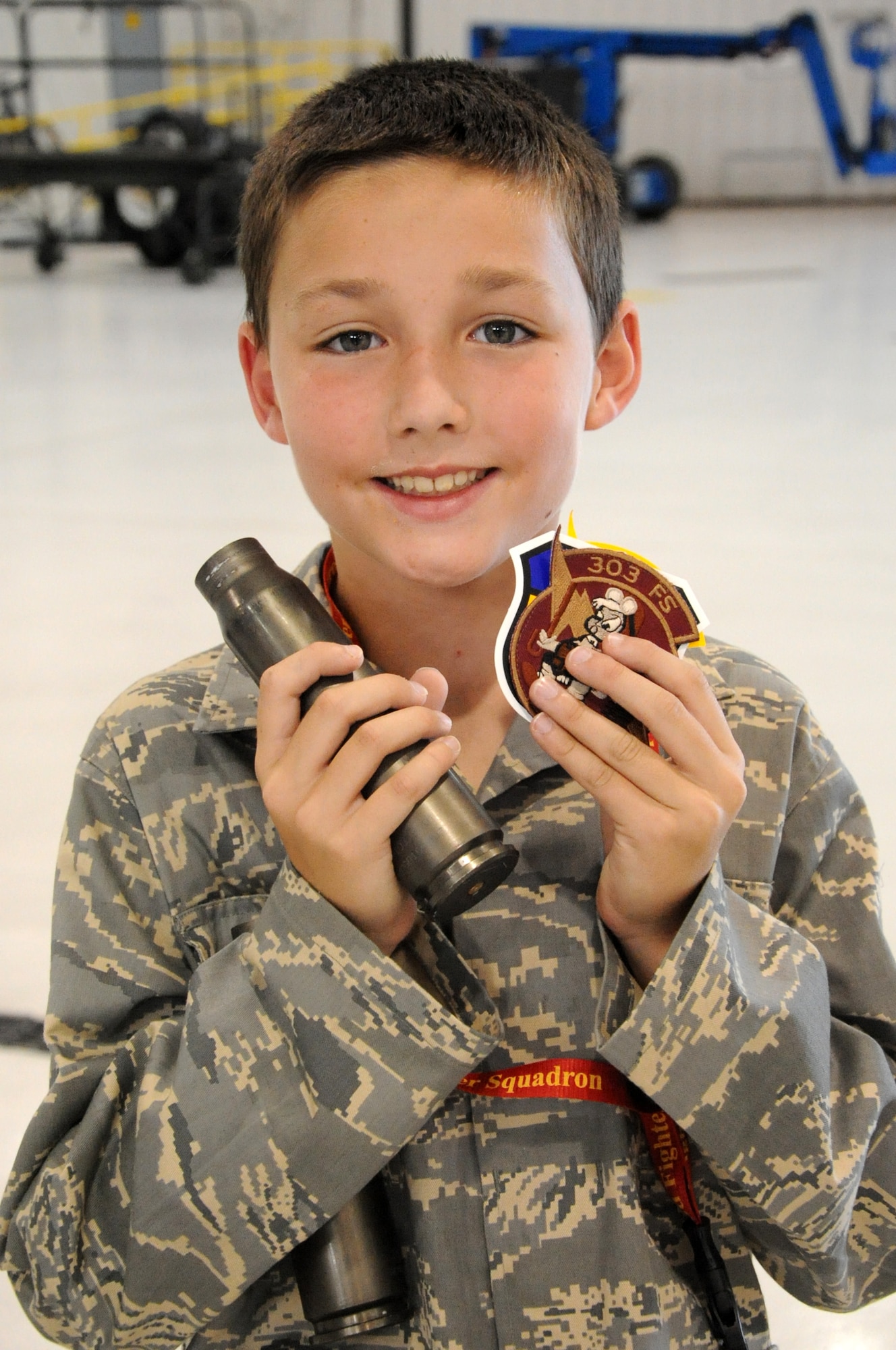 WHITEMAN AIR FORCE BASE, Mo. -- Michael Gracey, fourth-grade student, tours the 442nd Fighter Wing, July 26, 2012. Gracey, the son of an active-duty member here, was diagnosed with attention deficit hyperactive disorder and Asperger's syndrome in 2007. The 442nd Fighter Wing is an Air Force Reserve unit here. 
