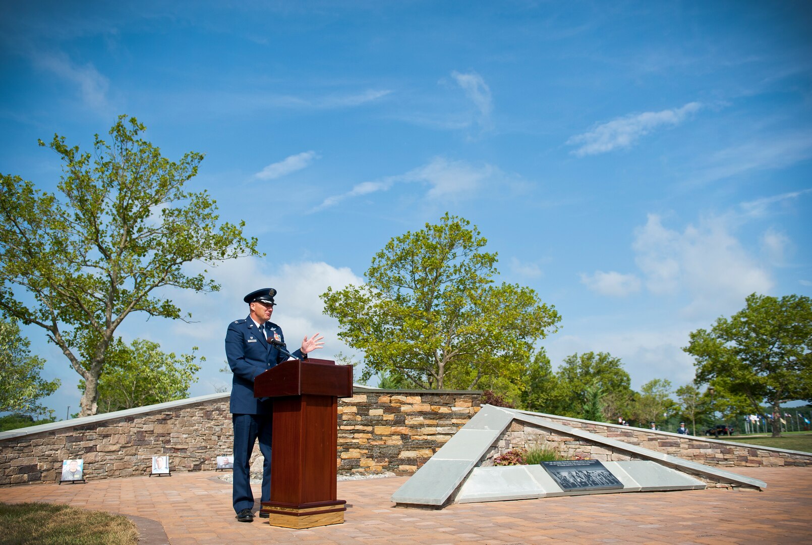 Colonel Olaf Holm, the commandant of the Air Advisory Academy, gives a
speech during the Air Advisor Memorial dedication ceremony at Joint
Base McGuire-Dix-Lakehurst, N.J., July 27, 2012. Holm was the creative
force behind the memorial project. (U.S. Air Force photo/Senior Airman
Andrew Lee)