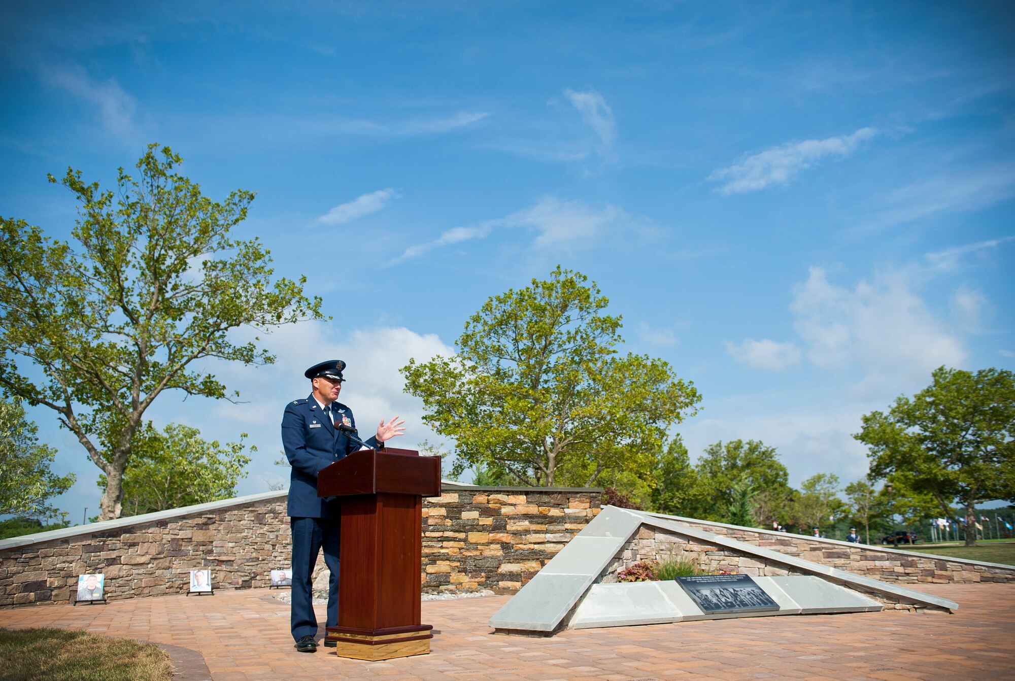 Colonel Olaf Holm, the commandant of the Air Advisory Academy, gives a
speech during the Air Advisor Memorial dedication ceremony at Joint
Base McGuire-Dix-Lakehurst, N.J., July 27, 2012. Holm was the creative
force behind the memorial project. (U.S. Air Force photo/Senior Airman
Andrew Lee)