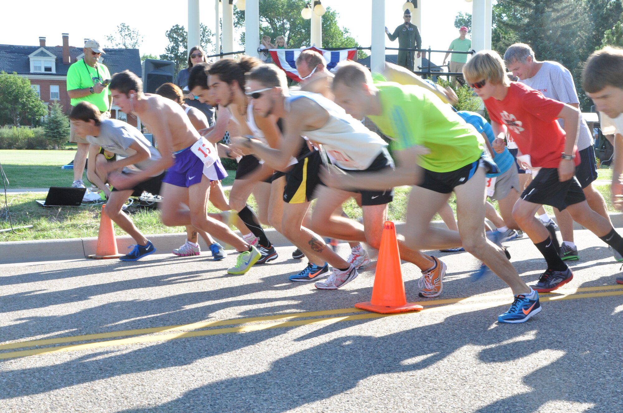 Members of both the base and Cheyenne community leap off the starting line of the 34th-annual Buffalo Stampede at F. E. Warren Air Force Base, Wyo. Col. George Farfour, 90th Missile Wing vice commander, signaled the beginning of the 5K and 10K fun run, which was open to the public and gave Warren members a chance to strengthen community ties. (U.S. Air Force photo by Tech. Sgt. Stacy Foster)