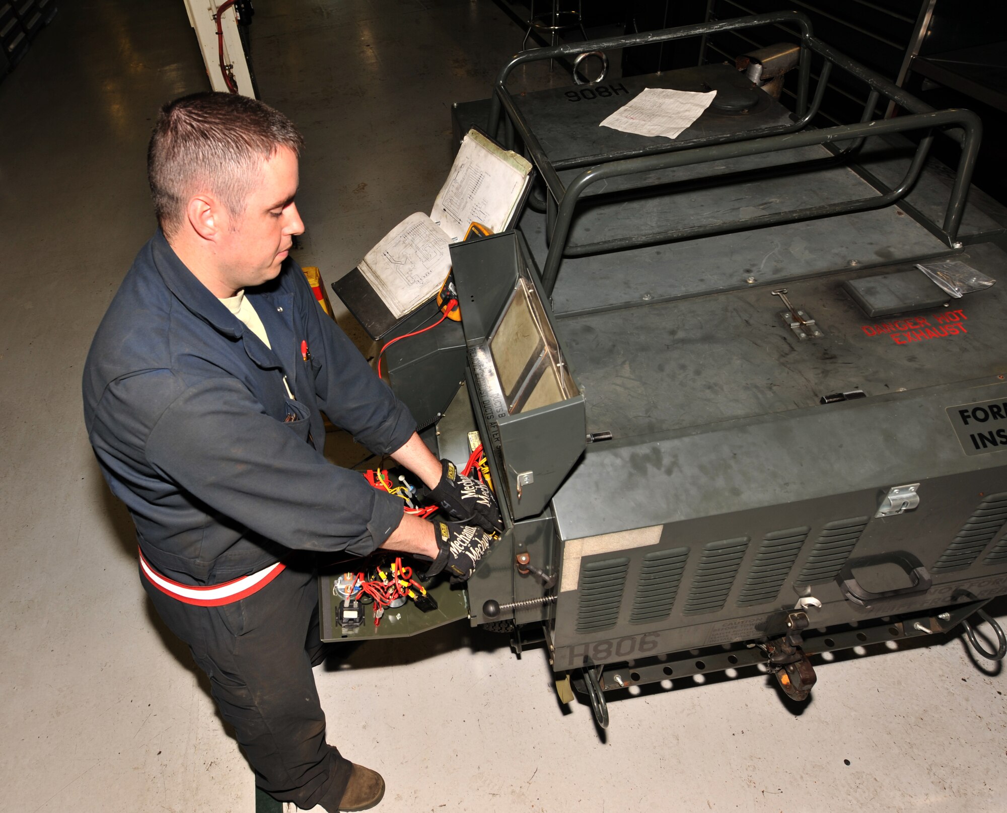 MINOT AIR FORCE BASE, N.D. -- Staff Sgt. Stephen Jech, 5th Maintenance Squadron aerospace ground equipment, troubleshoots a control panel here June 13. Team Minot's AGE works hard to ensure the 5th Bomb Wing is always ready through proven and efficient new maintenance processes, processes which have been benchmarked for use by many other bases. (U.S. Air Force Photo/Airman 1st Class Andrew Crawford)