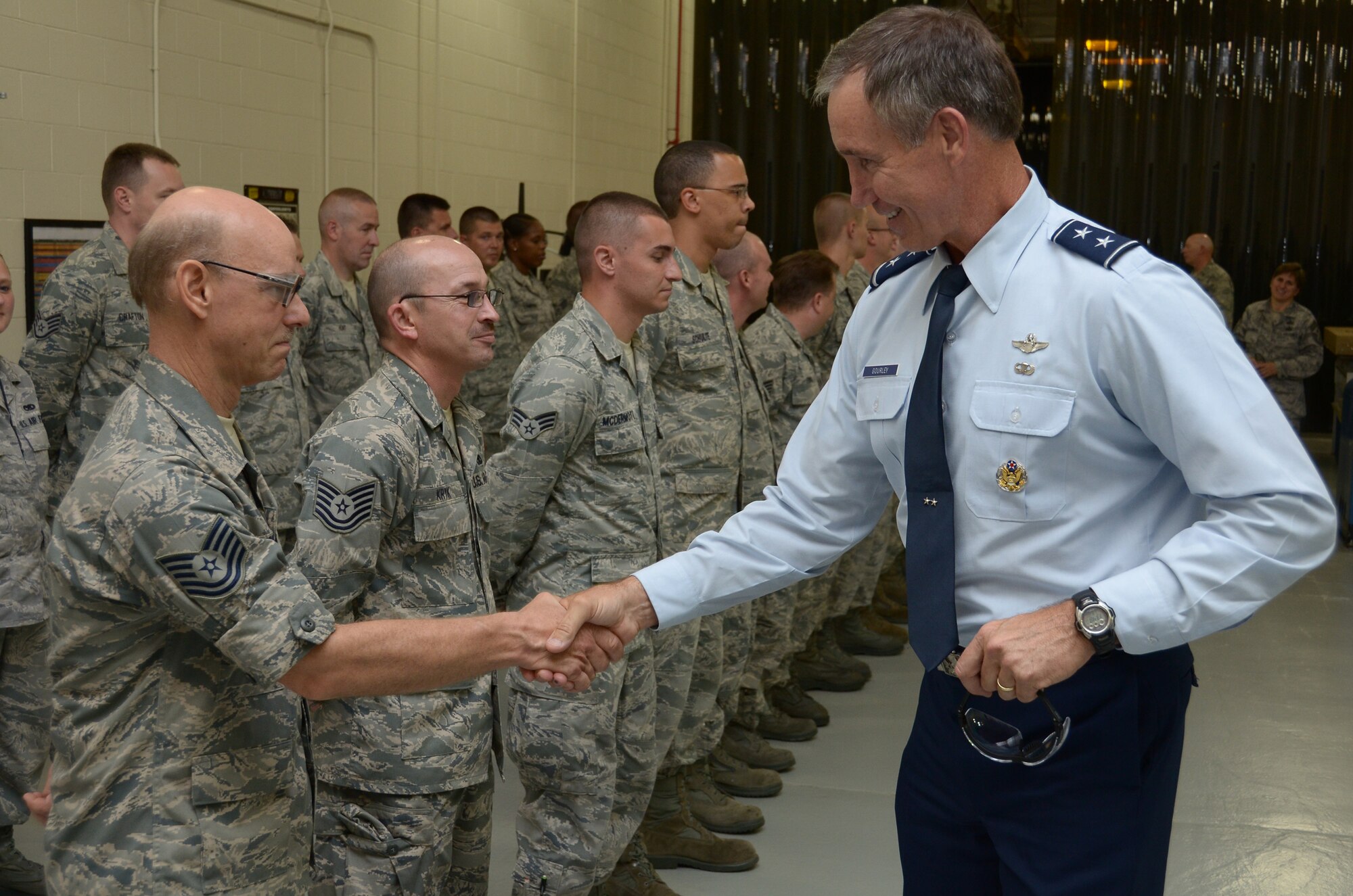 WRIGHT-PATTERSON AIR FORCE BASE, Ohio - Maj. Gen. Craig Neil Gourley, Vice Commander, Air Force Reserve Command, Robins Air Force Base, Ga., visits with Airmen assigned to the 445th Maintenance Squadron Fabrication Flight during his visit to the 445th Airlift Wing July 18. (U.S. Air Force photo/Staff Sgt. Mikhail Berlin)