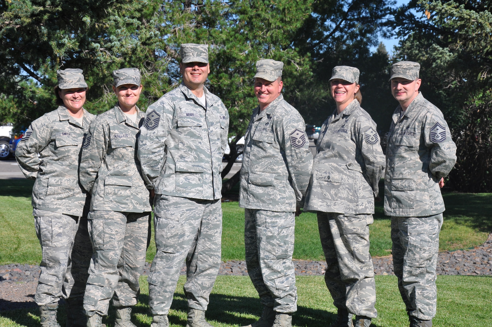 F. E. Warren Air Force Base’s diamond-wearing first sergeants pose for a photograph at the base golf course, July 19, prior to conducting a first sergeant council meeting. Warren’s diamond-wearing first sergeants are: Master Sgt. Nicole Smith, 90th Maintenance Group; Master Sgt. Tracy Wallace, 90th Civil Engineer Squadron; Master Sgt. Royal Maxey, 790th Missile Security Forces Squadron; Master Sgt. Todd Meaney, 90th Medical Group; Master Sgt. Faith McNelly, 30th Airlift Squadron; and Senior Master Sgt. Shawn Swidecki, 90th Operations Group. Not pictured: Master Sgt. Gearold Crouse, 90th Missile Security Forces Squadron; Master Sgt. Lloyd Hargis, 90th Logistics Readiness Squadron; Master Sgt. Daniel Flint, 90th Force Support Squadron. (U.S. Air Force photo by Senior Airman Mike Tryon)