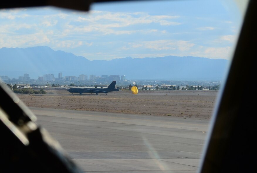 A B-52H Stratofortress lands using a drag shoot after flying a mission during Exercise Red Flag July 19 at Nellis Air Force Base, Nev. Red Flag provides an opportunity for Air Force Global Strike Command units to demonstrate their ability to deploy long-range strike forces and deliver precision effects that strengthen the nuclear enterprise. (U.S. Air Force photo/Tech. Sgt. Rebecca Zannetti)(RELEASED)