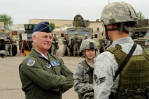 MINOT AIR FORCE BASE, N.D. -- Maj. Gen. Michael J. Carey, 20th Air Force commander, visits Minot to meet with Airmen of the 91st Missile Wing and to share his mission vision for the future during his first orientation visit here. General Carey's tour included meeting the Tactical Response Force, observing training demonstrations, as well as meeting with the Airmen of the Convoy Response Force. He also flew with a 54th Helicopter Squadron crew to visit a missile launch facility and speak with Airmen in the field before conducting his all-call at the base theater. (U.S. Air Force photo/Airman 1st Class Kristoffer Kaubisch)