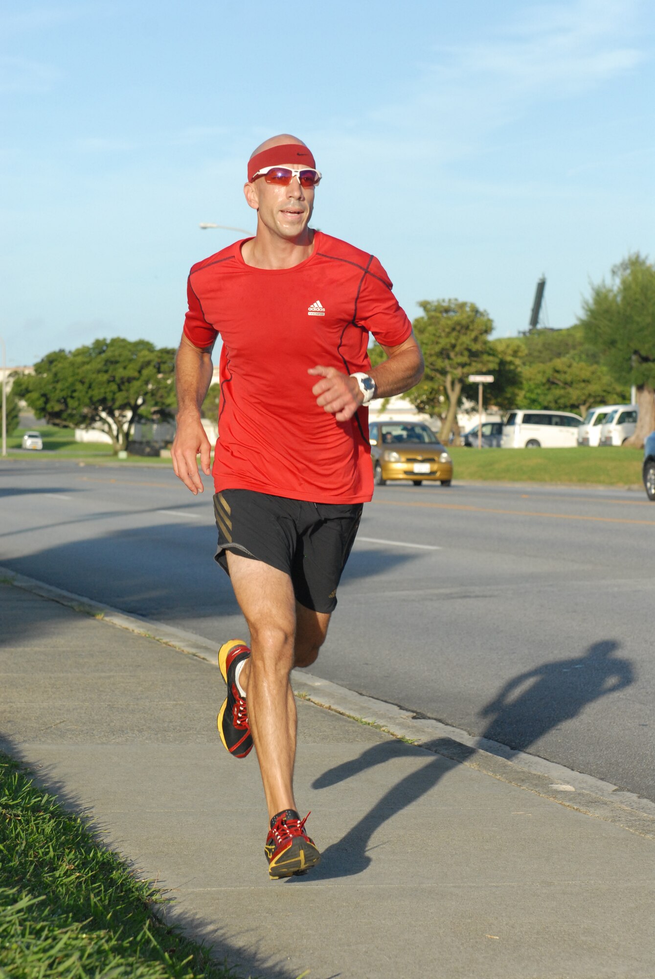 Master Sgt. Adam Leggio, 390th Intelligence Squadron chief of mission management, came in second in the male category at the Wing Staff Agencies Olympic Kick-off 5K Fun Run at Kadena Air Base, Japan, July 27, 2012. The event aimed to raise proceeds for the upcoming Air Force Ball planned for September 15, 2012. (U.S. Air Force photo/Airman 1st Class Hailey R. Davis)