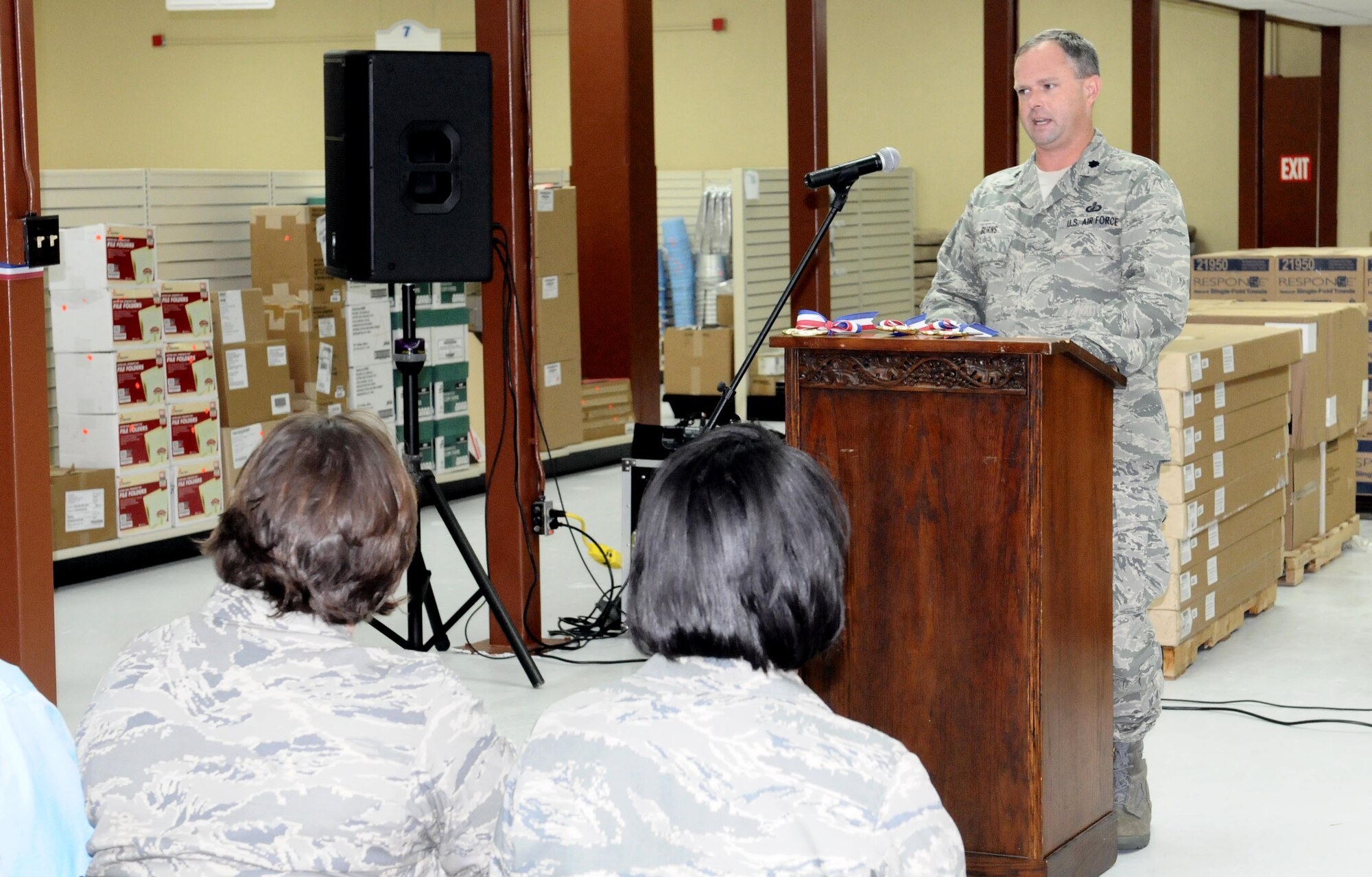 Lt. Col. Robert Burns, 36th Mission Support Group deputy commander, speaks at the ServMart grand opening here July 26. The ServMart carries more than 800 supplies to help military organizations complete mission requirements. (U.S. Air Force photo/Airman 1st Class Mariah Haddenham/Released)