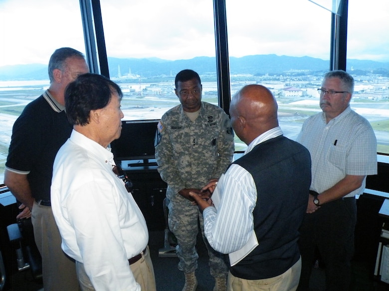 JAPAN — Lt. Gen. Thomas P. Bostick, U.S. Army Corps of Engineers commanding general, receives a briefing in the air traffic control tower during his visit to Marine Corps Air Station, Iwakuni, Japan July 19. Bostick was in Japan July 18-21, 2012 meeting with USACE Japan District members and learning firsthand about our great team on the leading edge of the engineering world in the Pacific.  