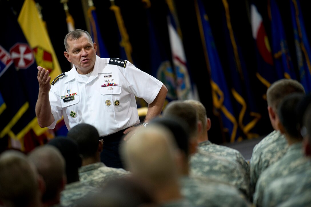 U.S. Army Gen. James D. Thurman, commander of U.S. Forces Korea, speaks to troops before a town hall meeting with U.S. Deputy Defense Secretary Ashton B. Carter on Camp Humphreys, South Korea, July 26, 2012.