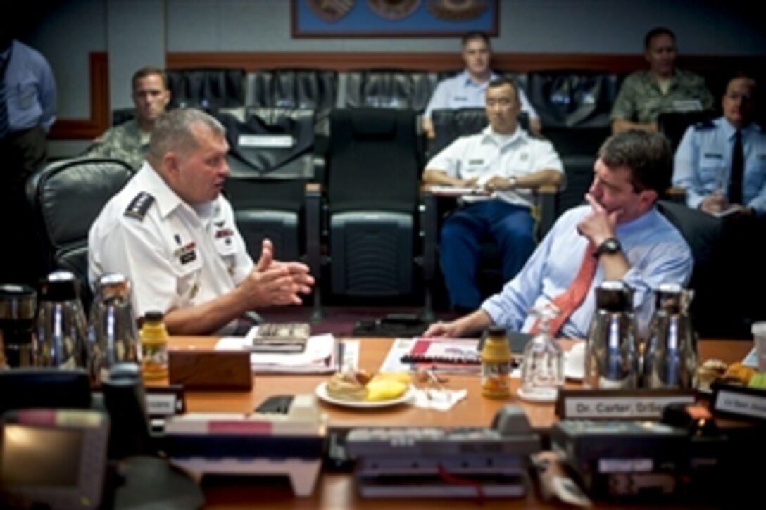 U.S. Army Gen. James D. Thurman, commander of U.S. Forces Korea, briefs U.S. Deputy Defense Secretary Ashton B. Carter on  U.S. Army Garrison Yongsan, South Korea, July 26, 2012. With his stop in South Korea, Carter concluded a 10-day Asia-Pacific trip during which he also met with partners in Hawaii, Guam, Japan, Thailand and India.