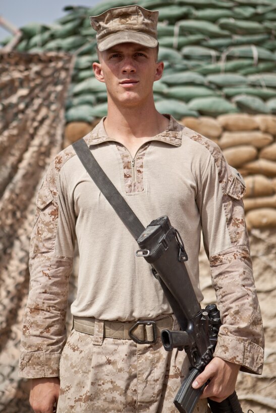 Lance Cpl. Joshua Taylor, assaultman, 2nd Platoon, Lima Company, 3rd Battalion, 8th Marine Regiment, Regimental Combat Team 6, stands outside of his tent at Combat Outpost Jaker, Afghanistan, July 27, 2012. Taylor deployed to Afghanistan a year after joining the Marine Corps. “I always hoped to be a part of history,” Taylor said. “It’s something I can be proud of.”