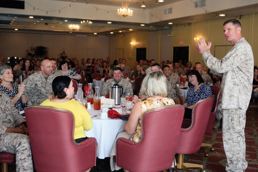 Maj. Gen. William D. Beydler addresses volunteers at the 3rd annual 1st Marine Aircraft Wing family readiness volunteer appreciation luncheon at the Butler Officers' Club at Camp Foster May 30. The unit, personal and family readiness program is about the readiness of personnel and families who make up the 1st MAW, said Beydler. The focus is to create tough Marines and ready families capable of thriving during times of crisis and separation from loved ones. Beydler is the commanding general of 1st MAW, III Marine Expeditionary Force.
