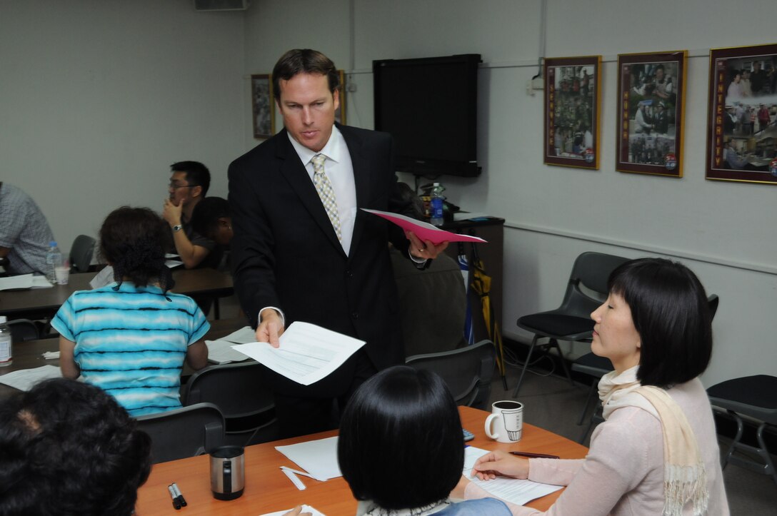 John Bendon, a consultant from Green Building, LLC, conducted a two day workshop July 14-15 to help prepare a group of engineers and interns from the U.S. Army Corps of Engineers, Far East District for the Leadership in Energy and Environmental Design accreditation test. (Photo by Patrick Bray)