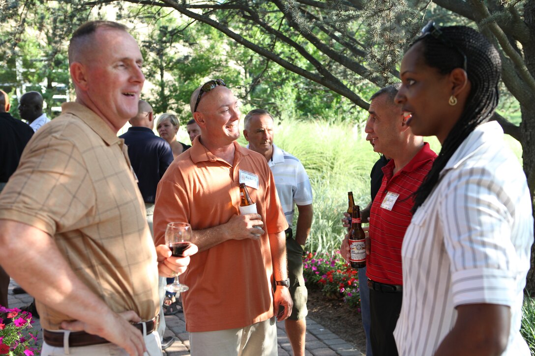 Attendees of the 2012 Sergeant Major of the Marine Corps Symposium attend a social at the Bolger Conference Center, Potomac, Md., July 29, 2012.