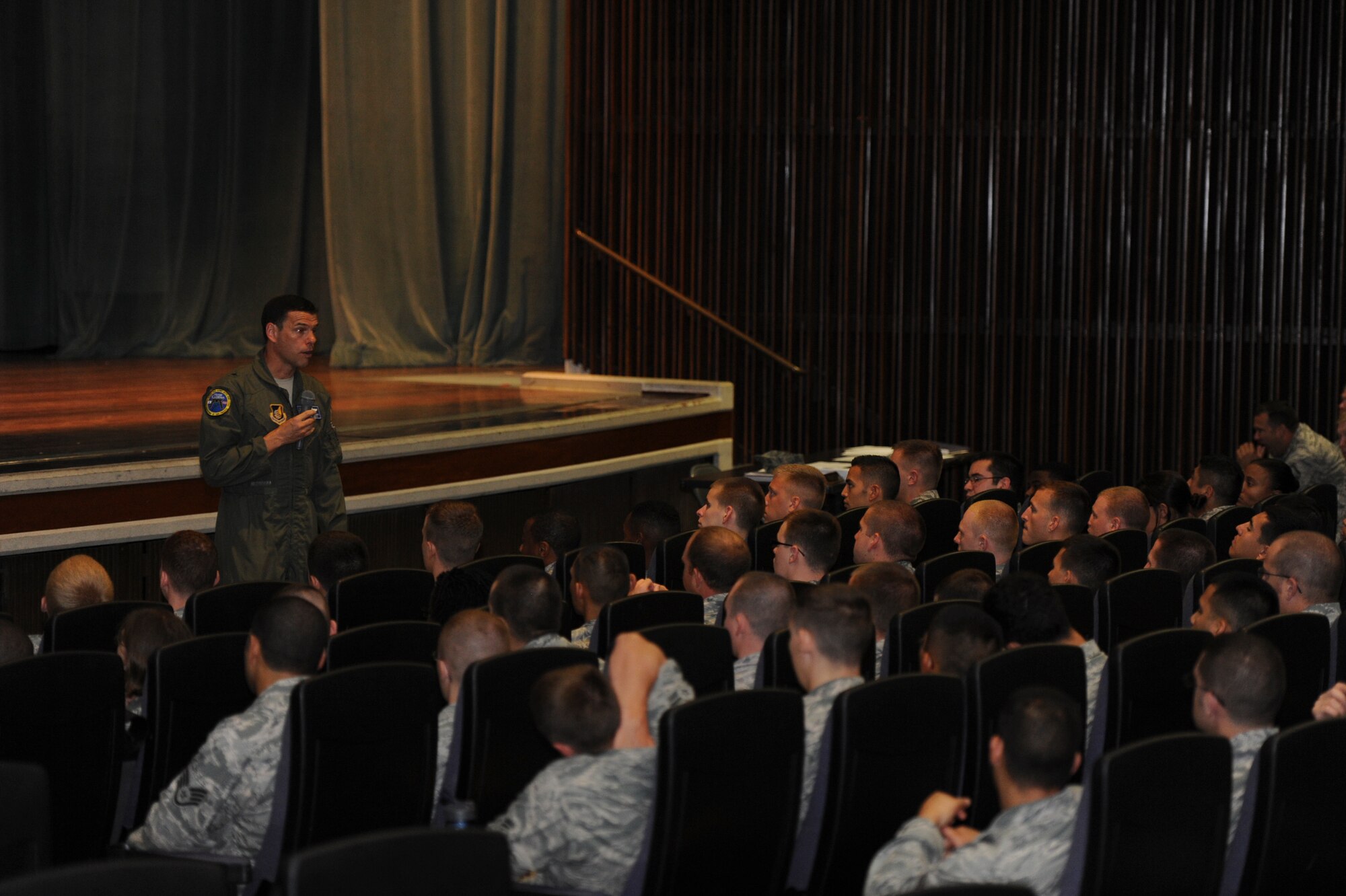 U.S. Air Force Brig. Gen. Matt Molloy, 18th Wing commander, welcomes more than 230 Airmen deployed from Joint Base Langley-Eustis, Va., supporting the F-22A Raptor on Kadena Air Base, Japan, July 31, 2012. The general discussed the mission of the Air Force’s largest combat wing and stressed the importance of good ambassadorship during their stay here in Japan. (U.S. Air Force photo/Airman 1st Class Justin Veazie)