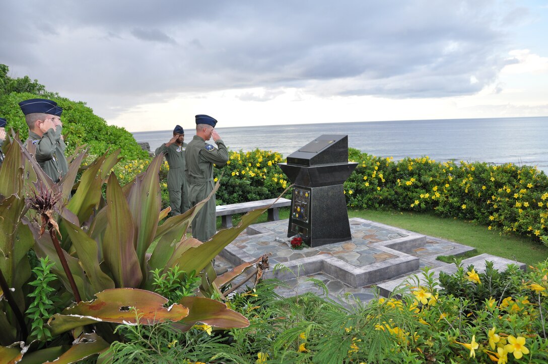 Members of the 69th Expeditionary Bomb Squadron render a salute to the
aircrew of Raider 21 at a memorial service at Adulep Point July 21. The
memorial service is held to honor the aircrew lost off the coast of Guam
during a routine mission in support of the 2008 Liberation Day parade. (U.S.
Air Force photo by Capt. Margaret Ingerslew/Released)  
