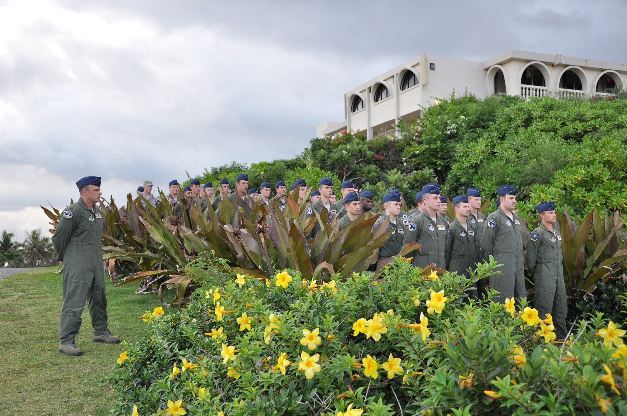 Members of the 69th Expeditionary Bomb Squadron stand in formation for the
Raider 21 memorial ceremony at Adelup Point July 21. A monument was
constructed in 2009 to honor the aircrew lost off the coast of Guam during a
routine mission in support of the 2008 Liberation Day parade. (U.S. Air
Force photo by Capt. Margaret Ingerslew/Released)
