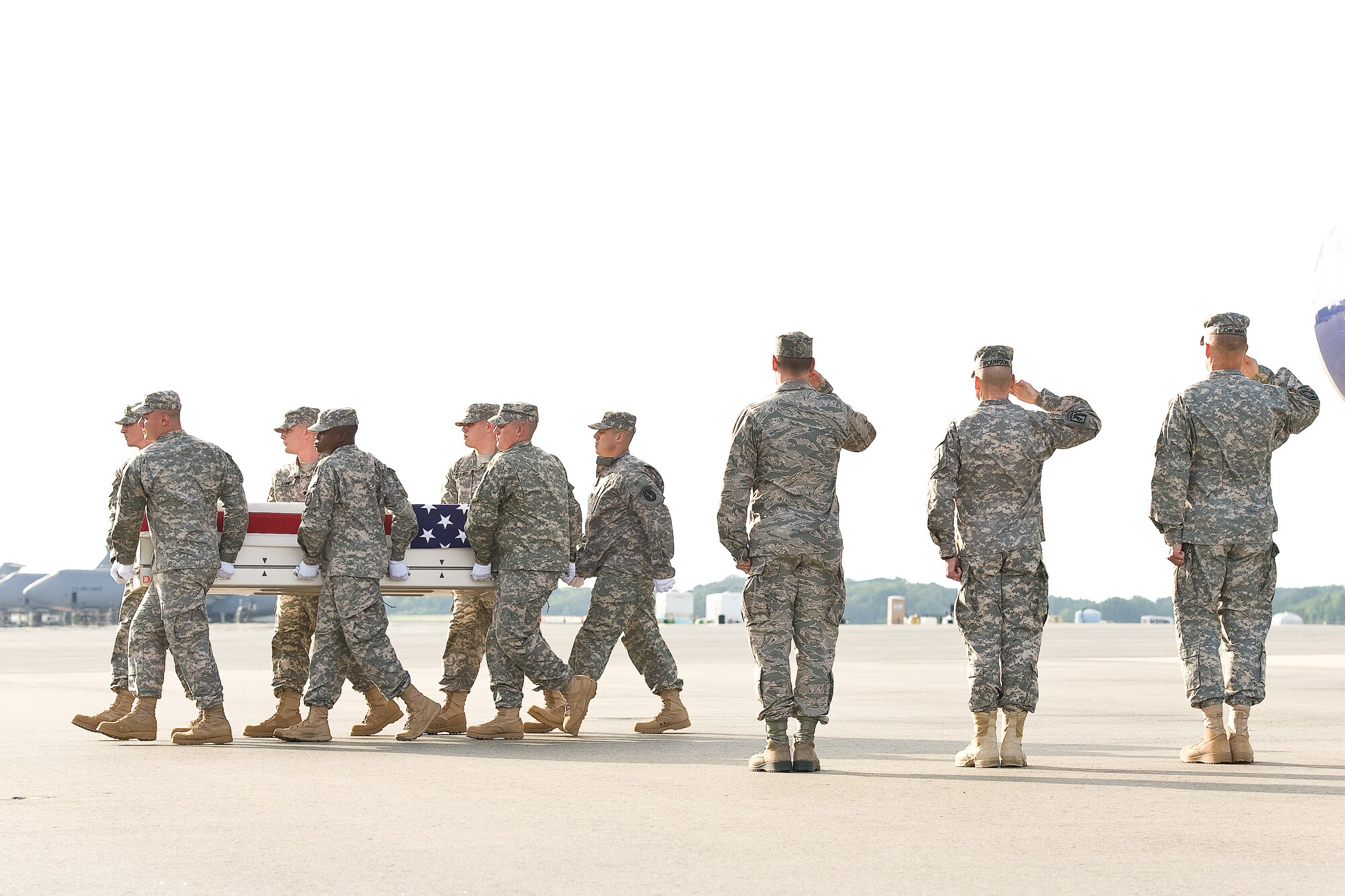 A U.S. Army carry team transfers the remains of Army Pfc. Jose Oscar Belmontes, of La Verne, Calif., at Dover Air Force Base, Del., July 30, 2012. Belmontes was assigned to the 630th Engineer Company, 7th Engineer Battalion, 10th Sustainment Brigade, Fort Drum, N.Y. (U.S. Air Force photo/Roland Balik)
