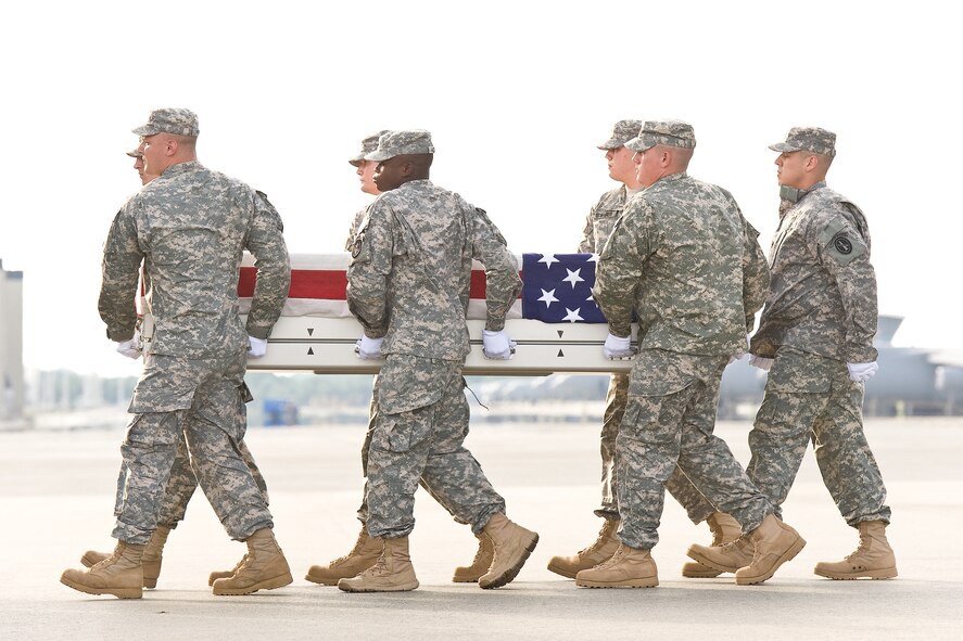 A U.S. Army carry team transfers the remains of Army Spc. Benjamin C. Pleitez, of Turlock, Calif., at Dover Air Force Base, Del., July 30, 2012. Pleitez was assigned to the 1072nd Transportation Company, 746th Combat Support Battalion, 224th Sustainment Brigade, Van Nuys, Calif. (U.S. Air Force photo/Roland Balik)
