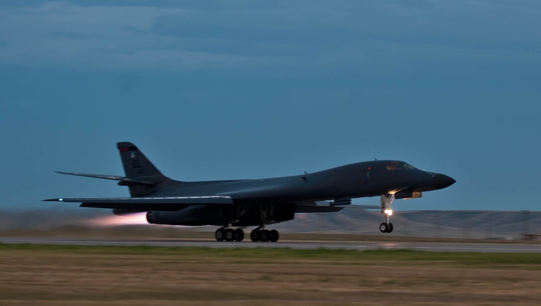 A B-1 bomber thunders down the flightline during the start of a training mission at Ellsworth Air Force Base, S.D., July 24, 2012. B-1 aircrews consisting of two pilots and two weapon systems officers complete training sorties to meet flight certifications and to have their skills to ensure they are ready for any combat situation anywhere around the world. (U.S. Air Force photo by Airman 1st Class Zachary Hada/Released)